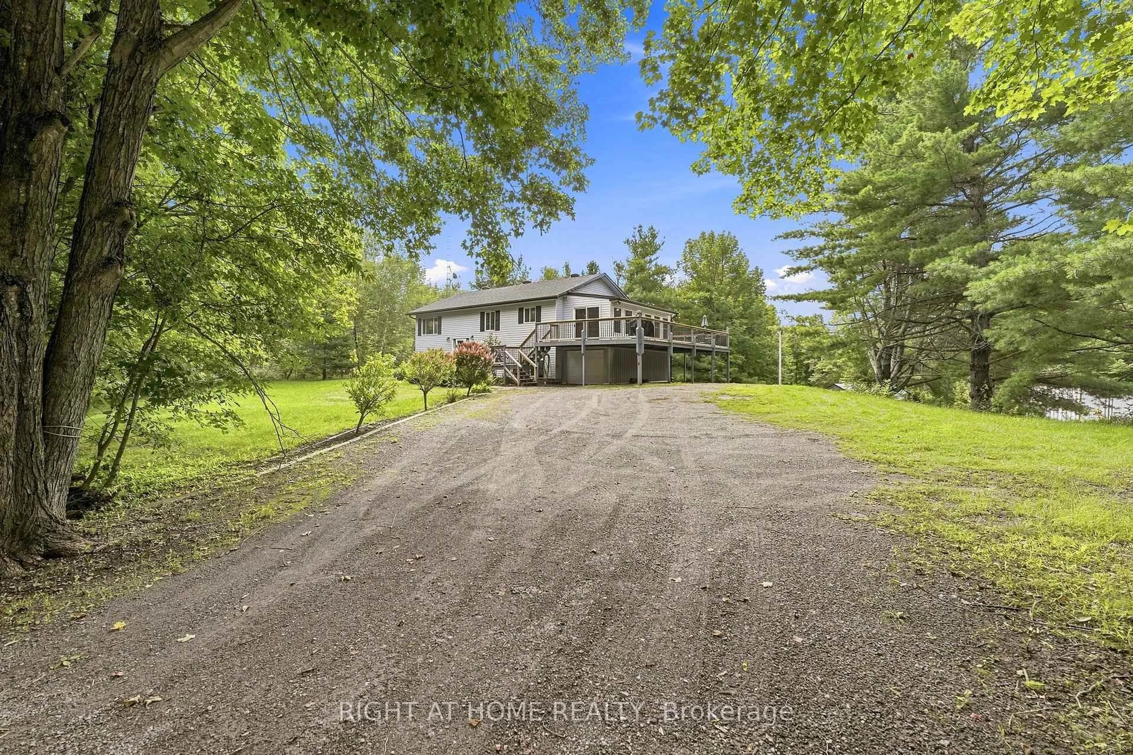 A pic from outside/outdoor area/front of a property/back of a property/a pic from drone, water/lake/river/ocean view for 489 Twin Sisters Lake Rd, Limoges Ontario K0K 2M0