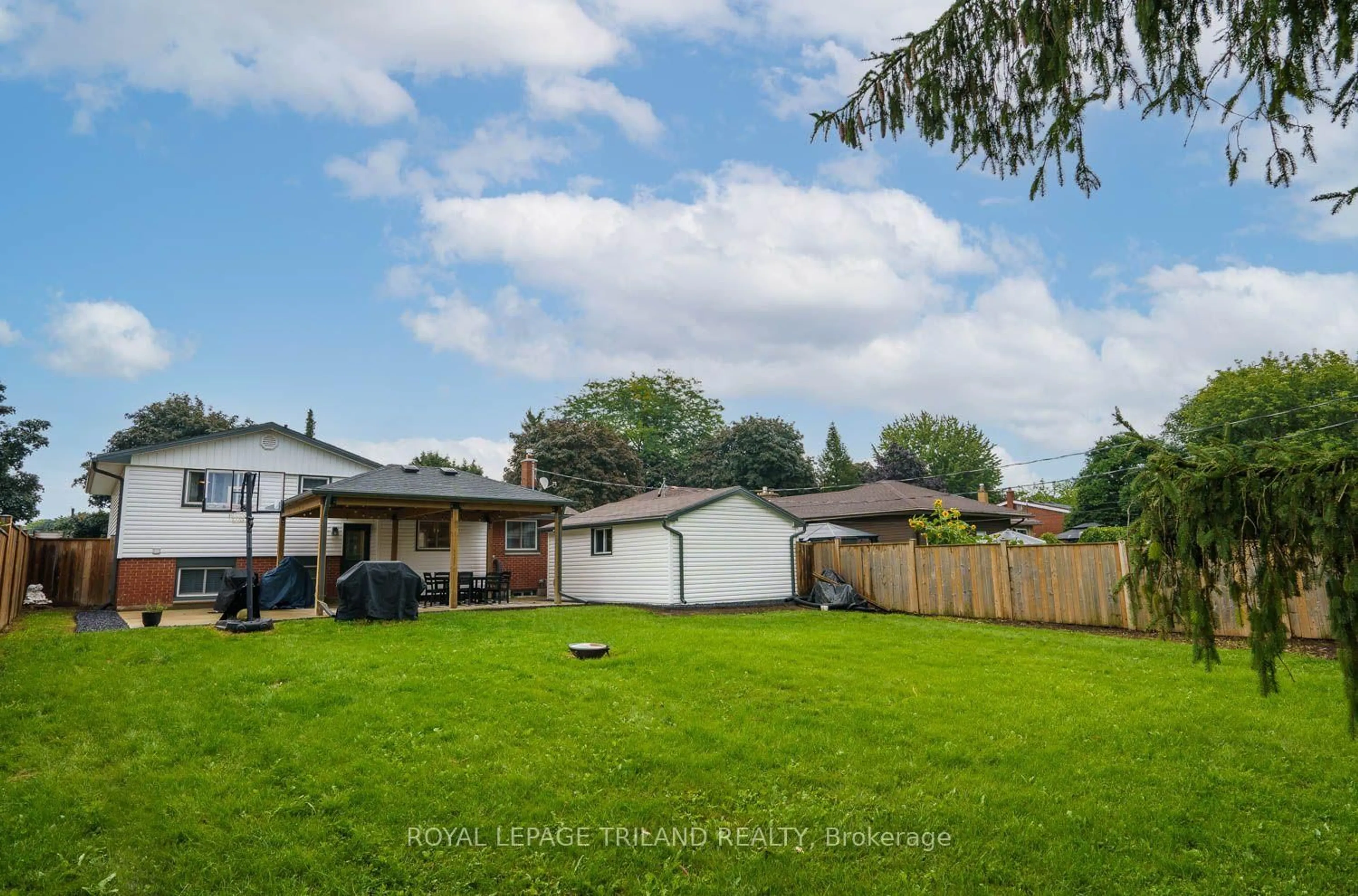 A pic from outside/outdoor area/front of a property/back of a property/a pic from drone, water/lake/river/ocean view for 93 Goldwick Cres, London East Ontario N5V 2K9