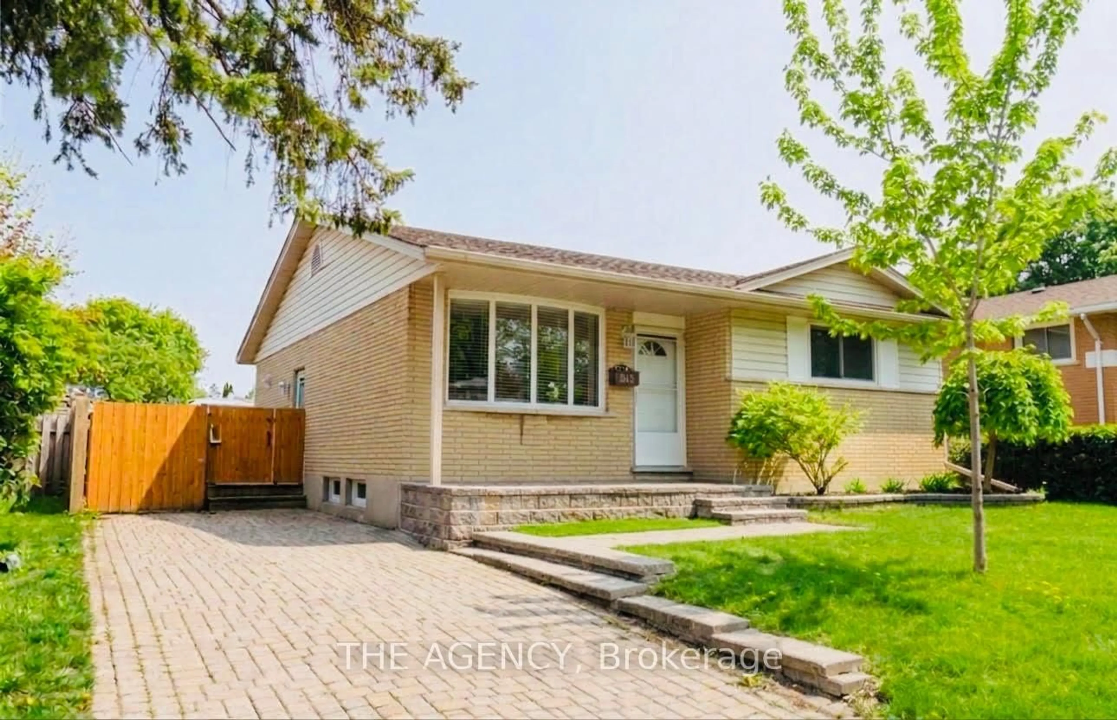 Home with brick exterior material, street for 615 Dogwood Lane, Waterloo Ontario N2L 4Y2
