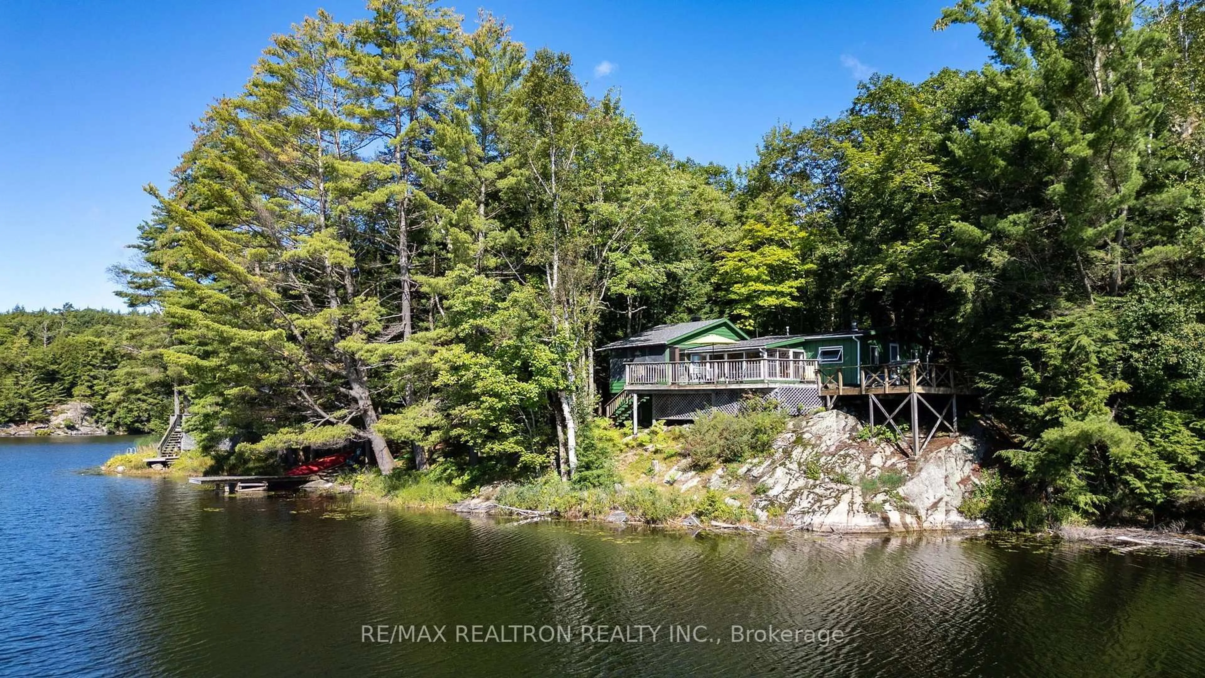 A pic from outside/outdoor area/front of a property/back of a property/a pic from drone, water/lake/river/ocean view for 54 MATTHEWS-GARCIA Rd, Seguin Ontario P2A 2W8