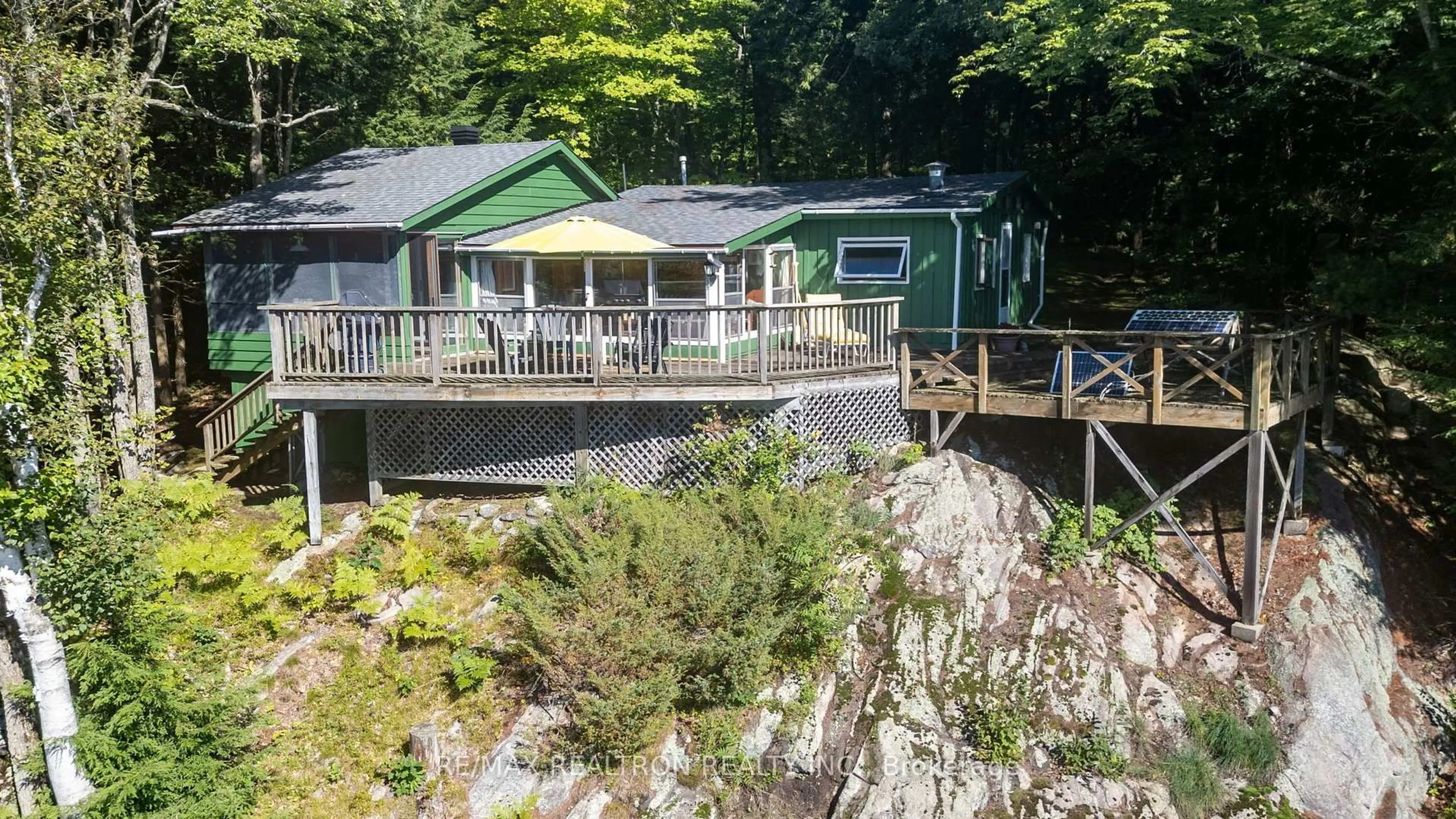 A pic from outside/outdoor area/front of a property/back of a property/a pic from drone, water/lake/river/ocean view for 54 MATTHEWS-GARCIA Rd, Seguin Ontario P2A 2W8