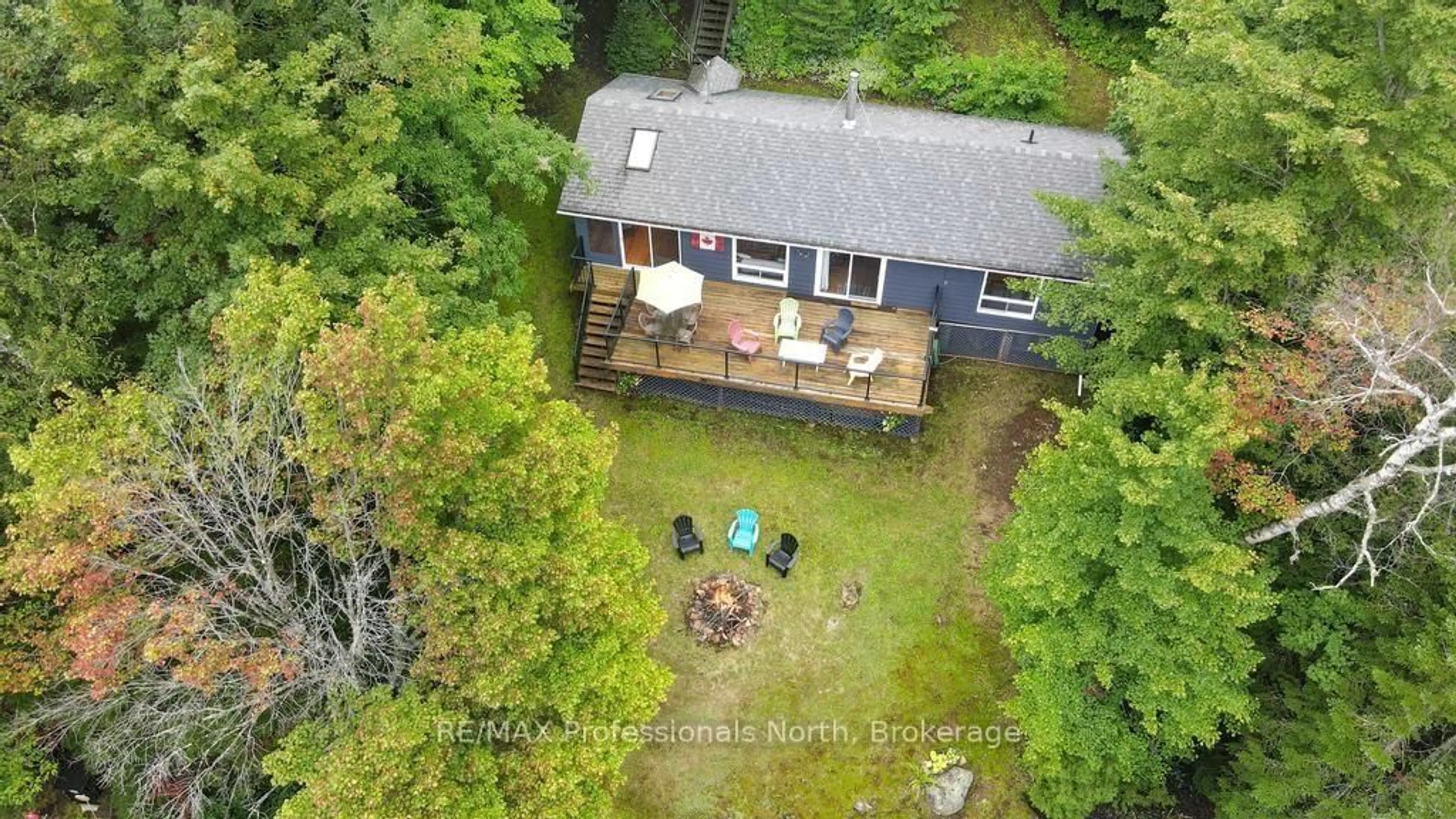 A pic from outside/outdoor area/front of a property/back of a property/a pic from drone, water/lake/river/ocean view for 1036 Bad Habit Tr, Dysart et al Ontario K0M 1S0