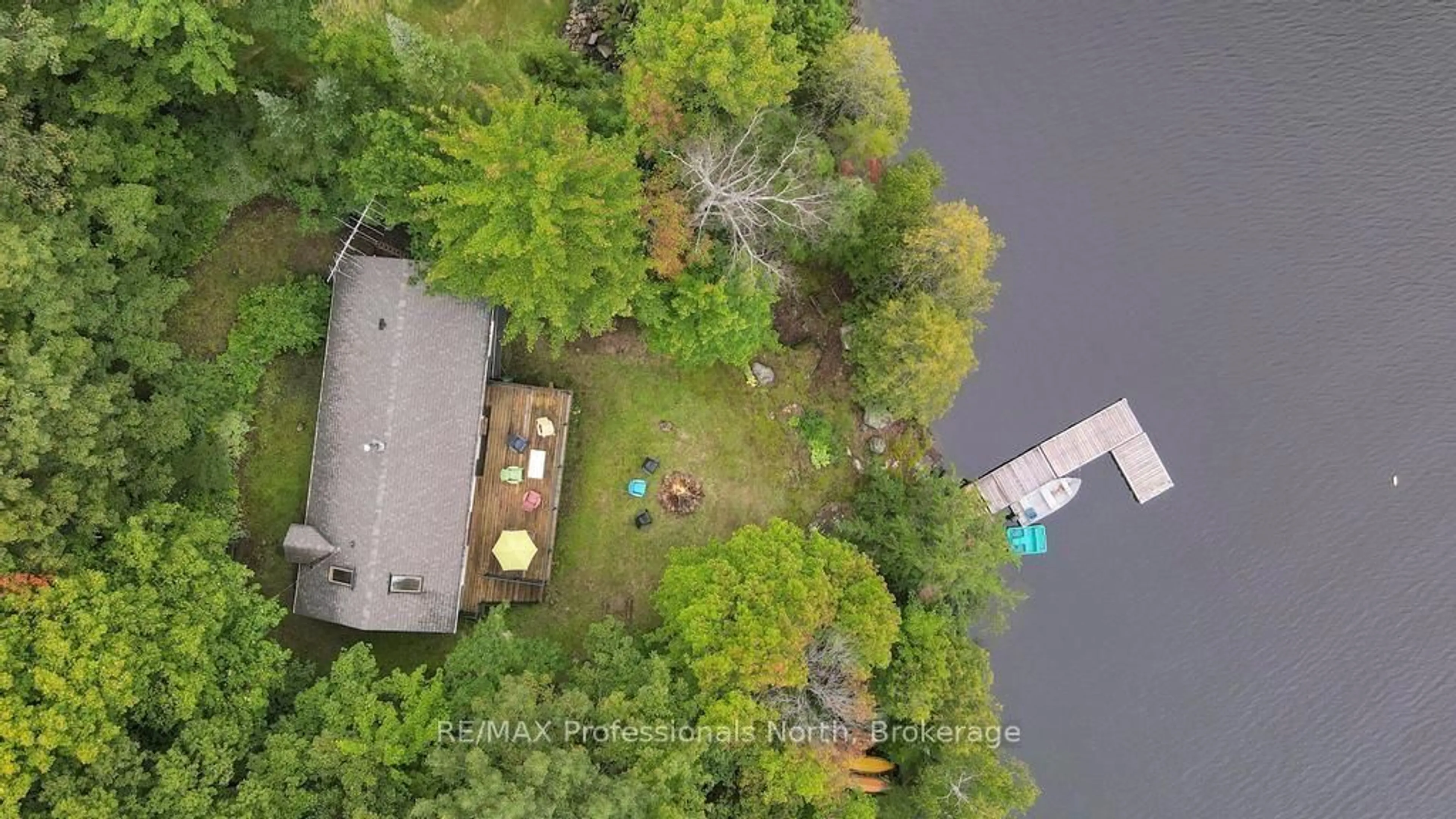 A pic from outside/outdoor area/front of a property/back of a property/a pic from drone, water/lake/river/ocean view for 1036 Bad Habit Tr, Dysart et al Ontario K0M 1S0