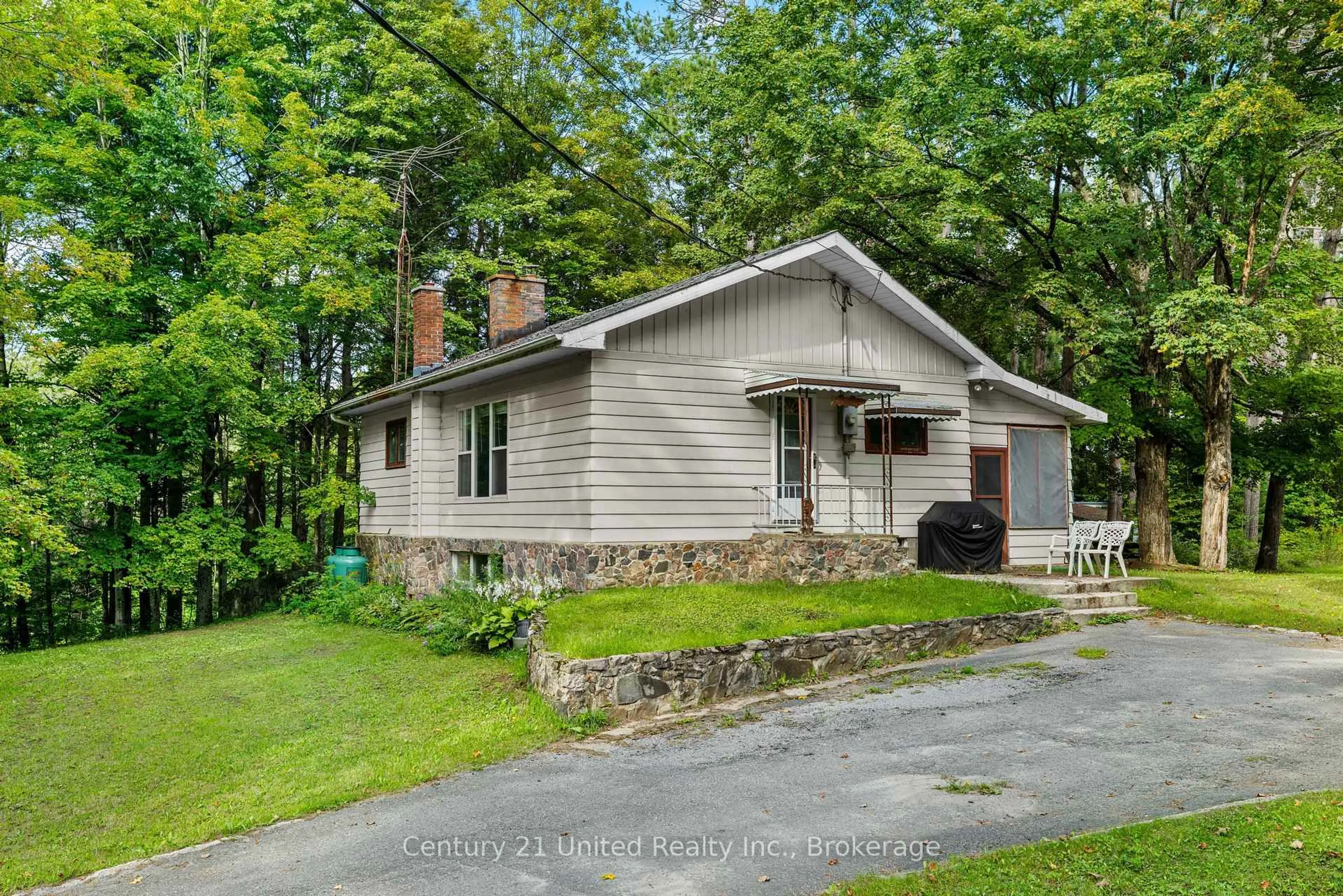A pic from outside/outdoor area/front of a property/back of a property/a pic from drone, street for 49 Mcfadden Rd, North Kawartha Ontario K0L 1A0