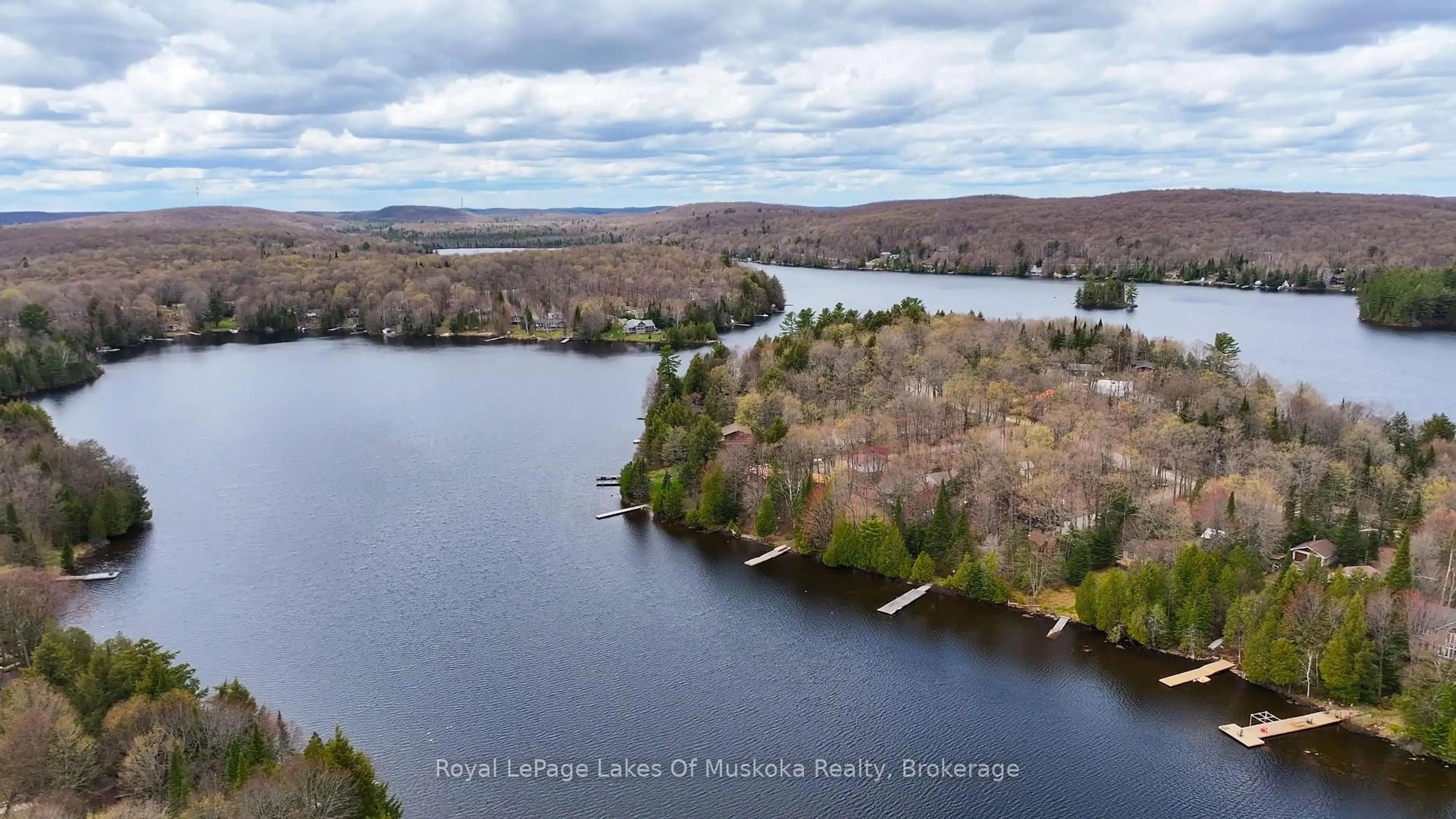 A pic from outside/outdoor area/front of a property/back of a property/a pic from drone, water/lake/river/ocean view for 22 Frank Lane, Perry Ontario P0A 1J0