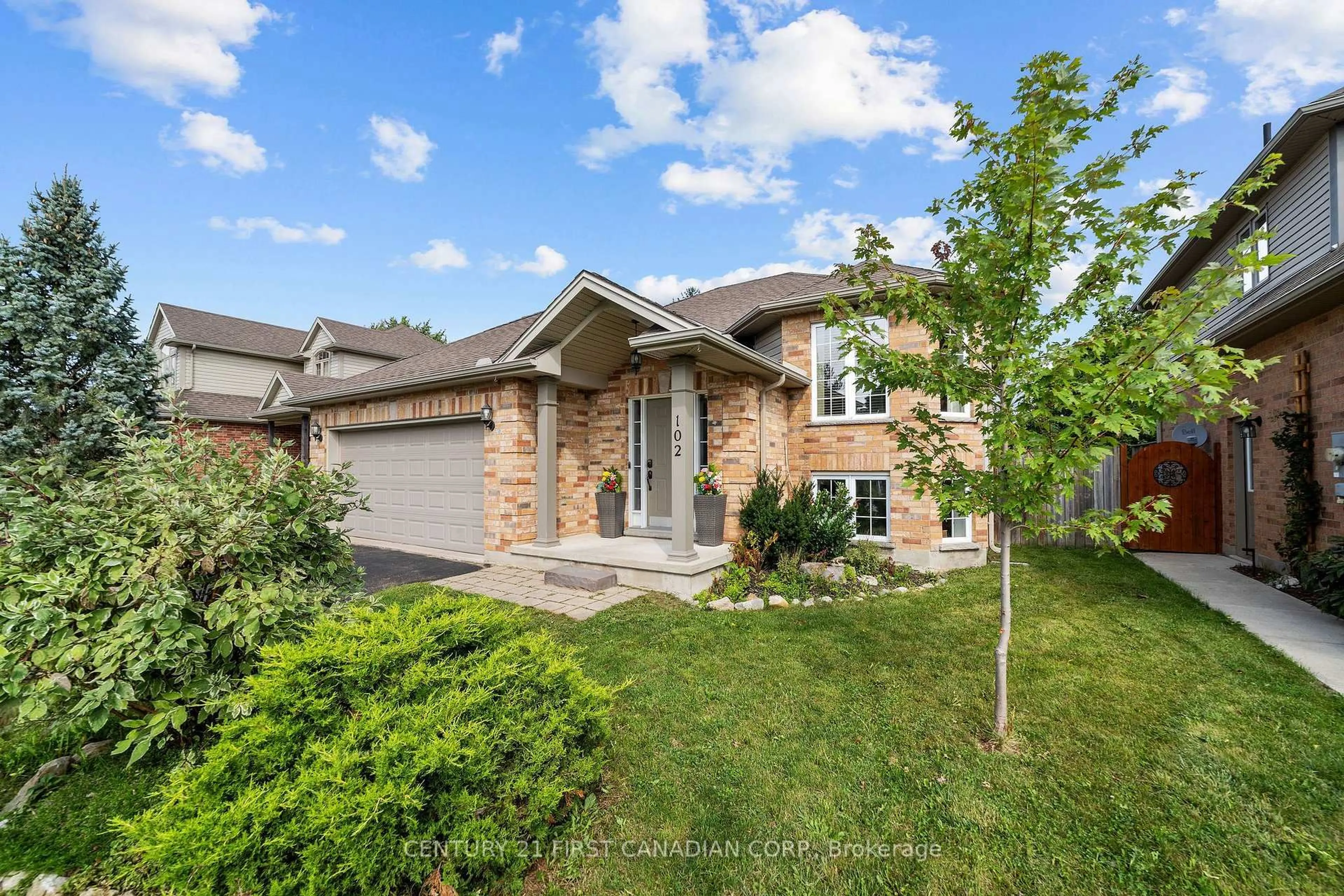 Home with brick exterior material, street for 102 Watson St, Lucan Biddulph Ontario N0M 2J0