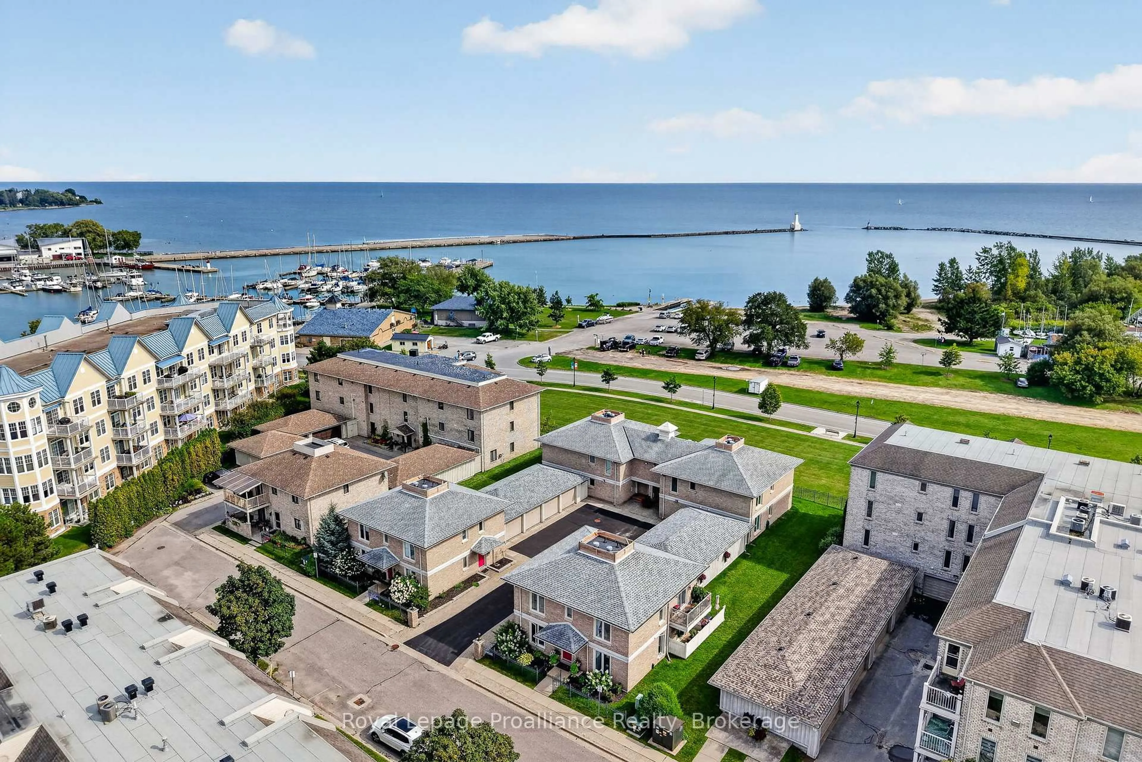 A pic from outside/outdoor area/front of a property/back of a property/a pic from drone, water/lake/river/ocean view for 101 Marisa Lane #2, Cobourg Ontario K9A 5N6
