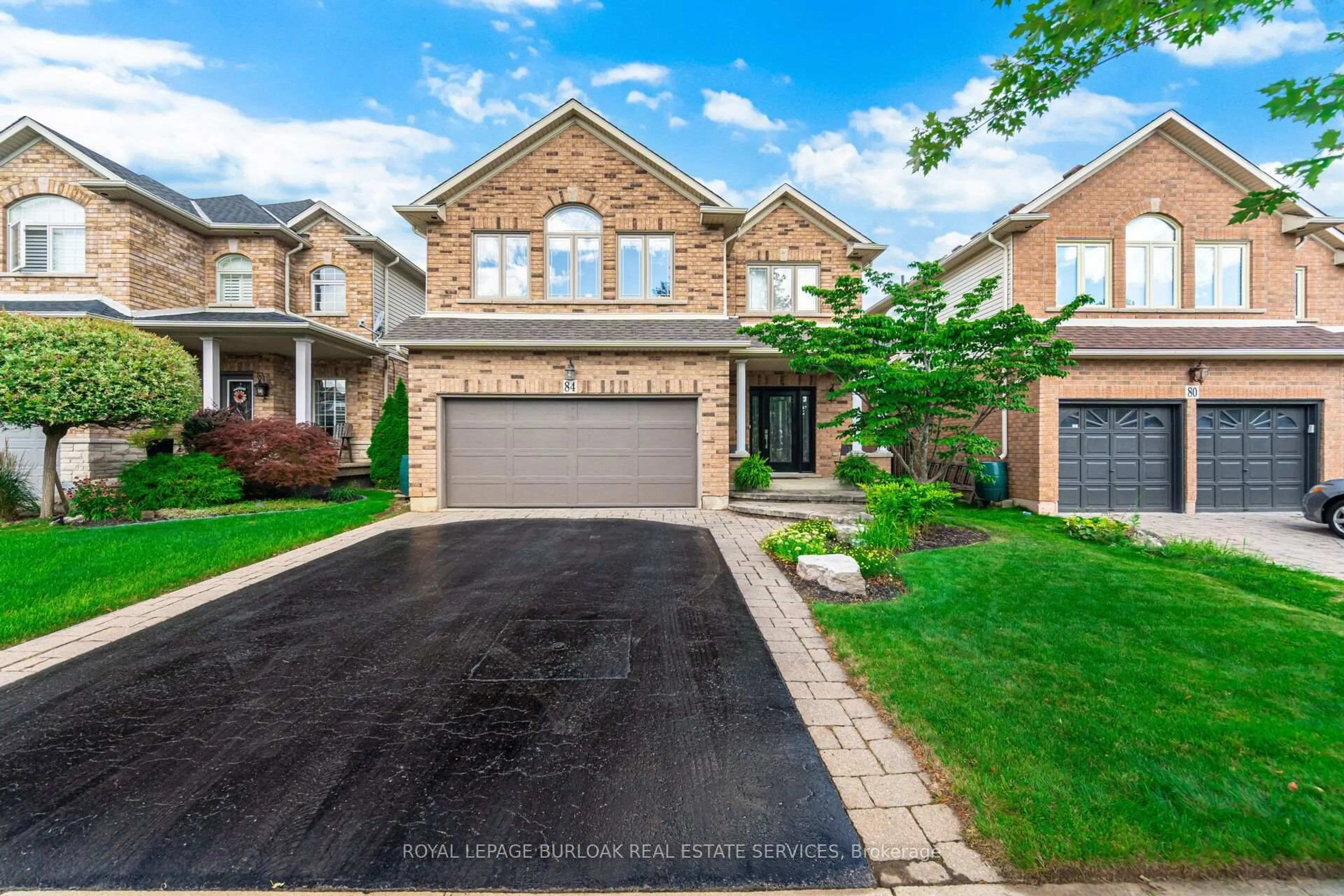 Home with brick exterior material, street for 84 Meadowbank Dr, Hamilton Ontario L9B 2Y1