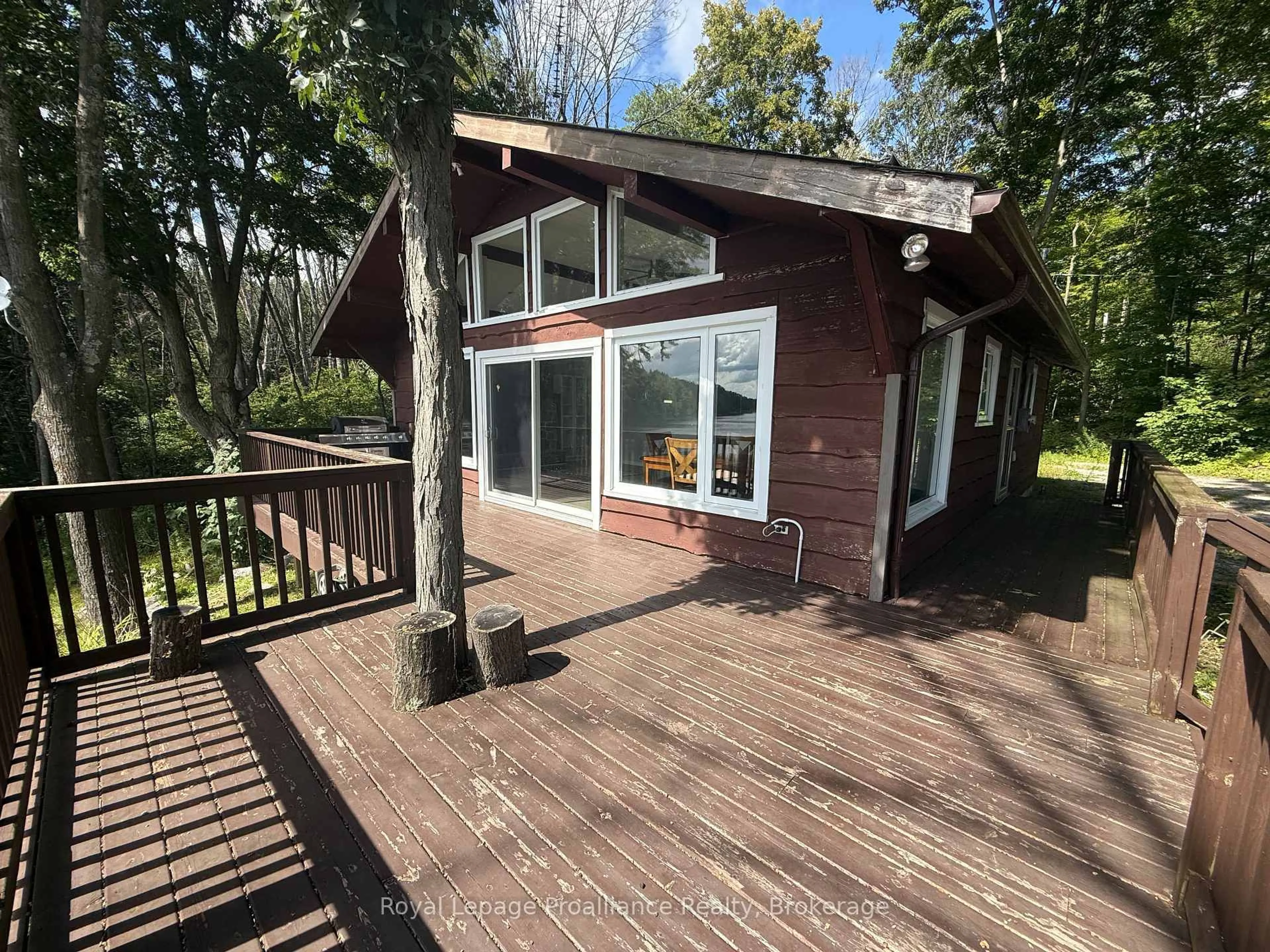 A pic from outside/outdoor area/front of a property/back of a property/a pic from drone, water/lake/river/ocean view for 214 Lakeview Lane, Tweed Ontario K0K 3J0