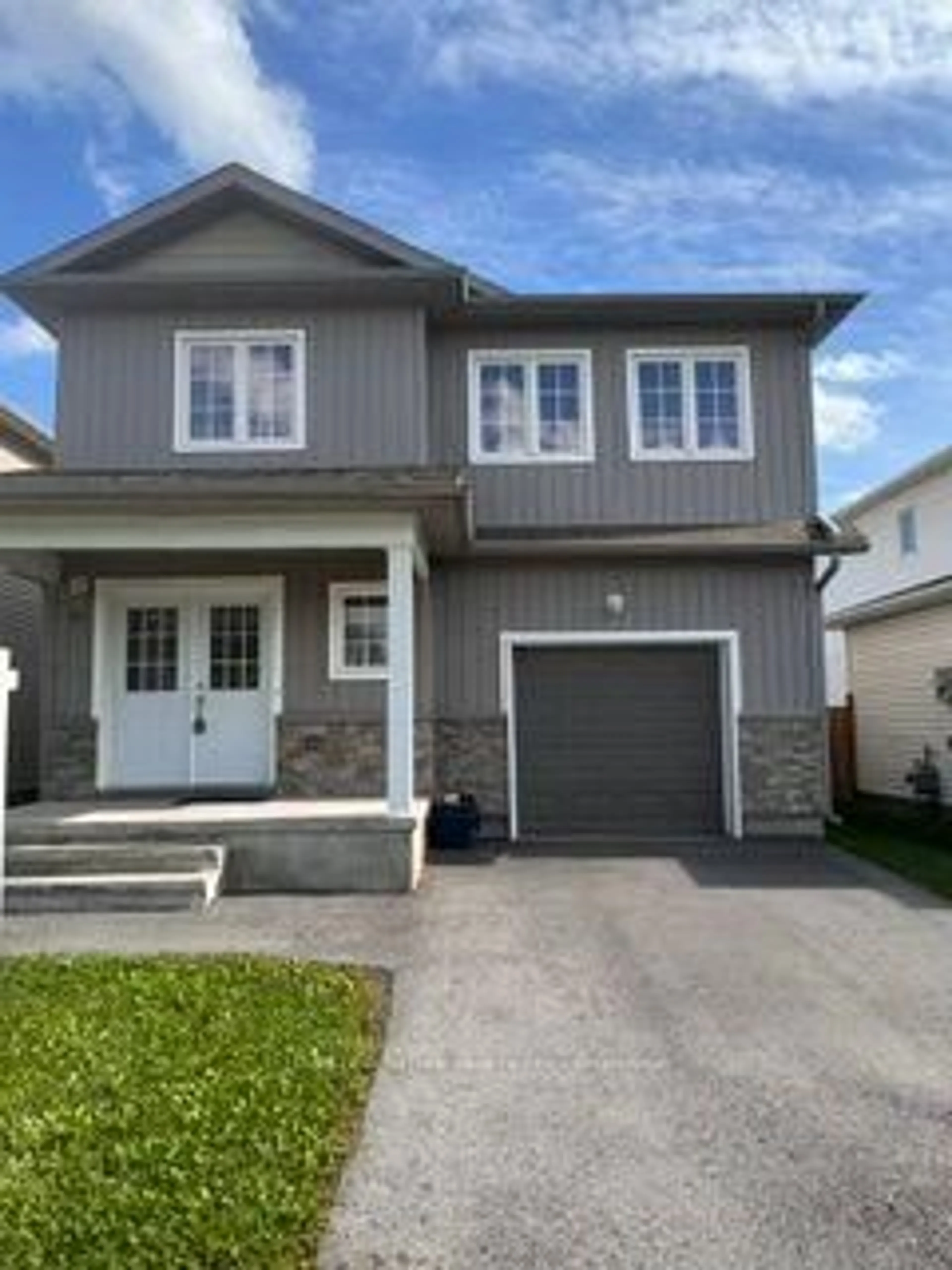 Home with vinyl exterior material, street for 39 Brennan Cres, Bath Ontario K0H 1G0