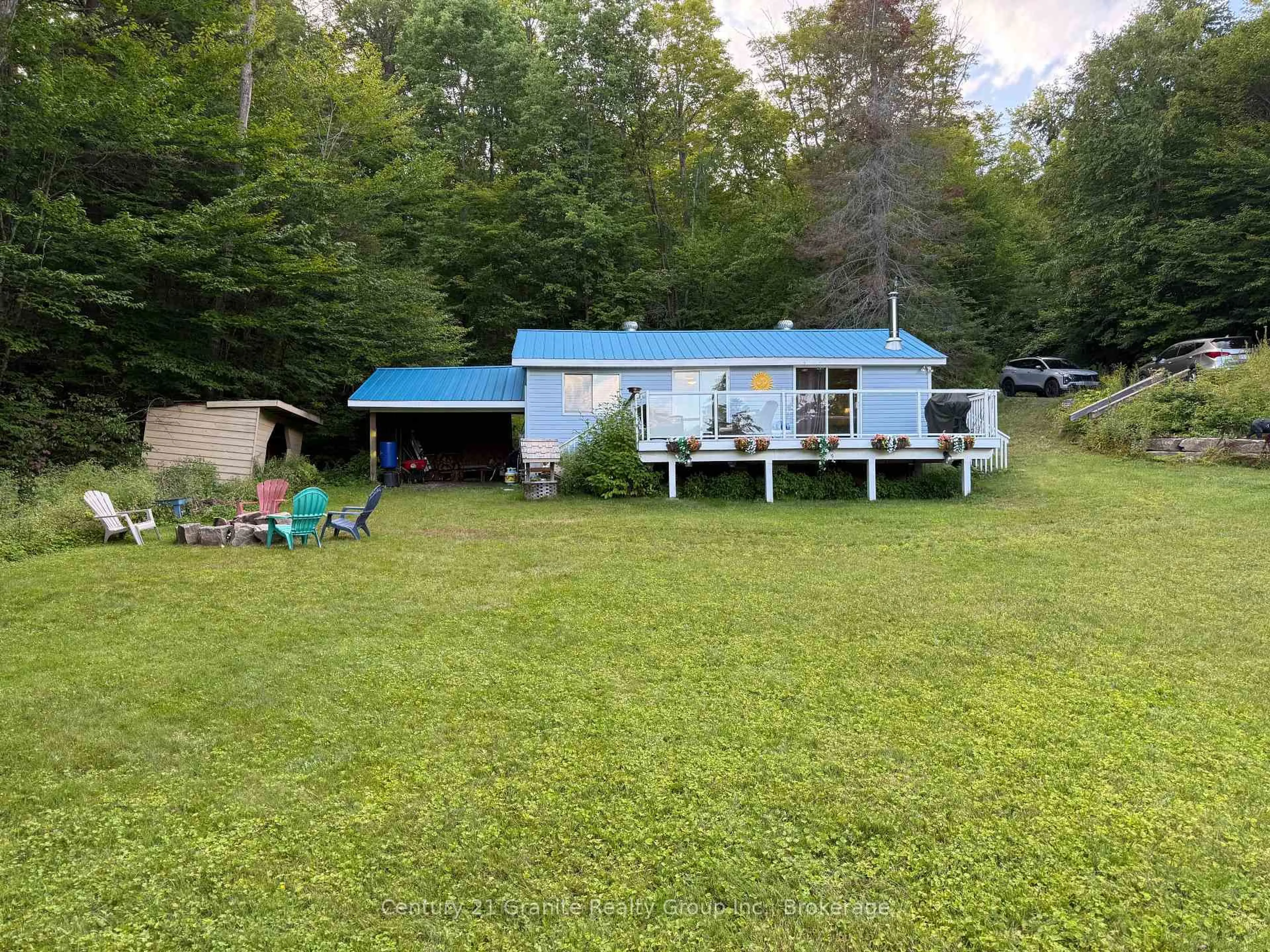 A pic from outside/outdoor area/front of a property/back of a property/a pic from drone, water/lake/river/ocean view for 1292 Bitter Lake Rd, Dysart et al Ontario K0M 1S0