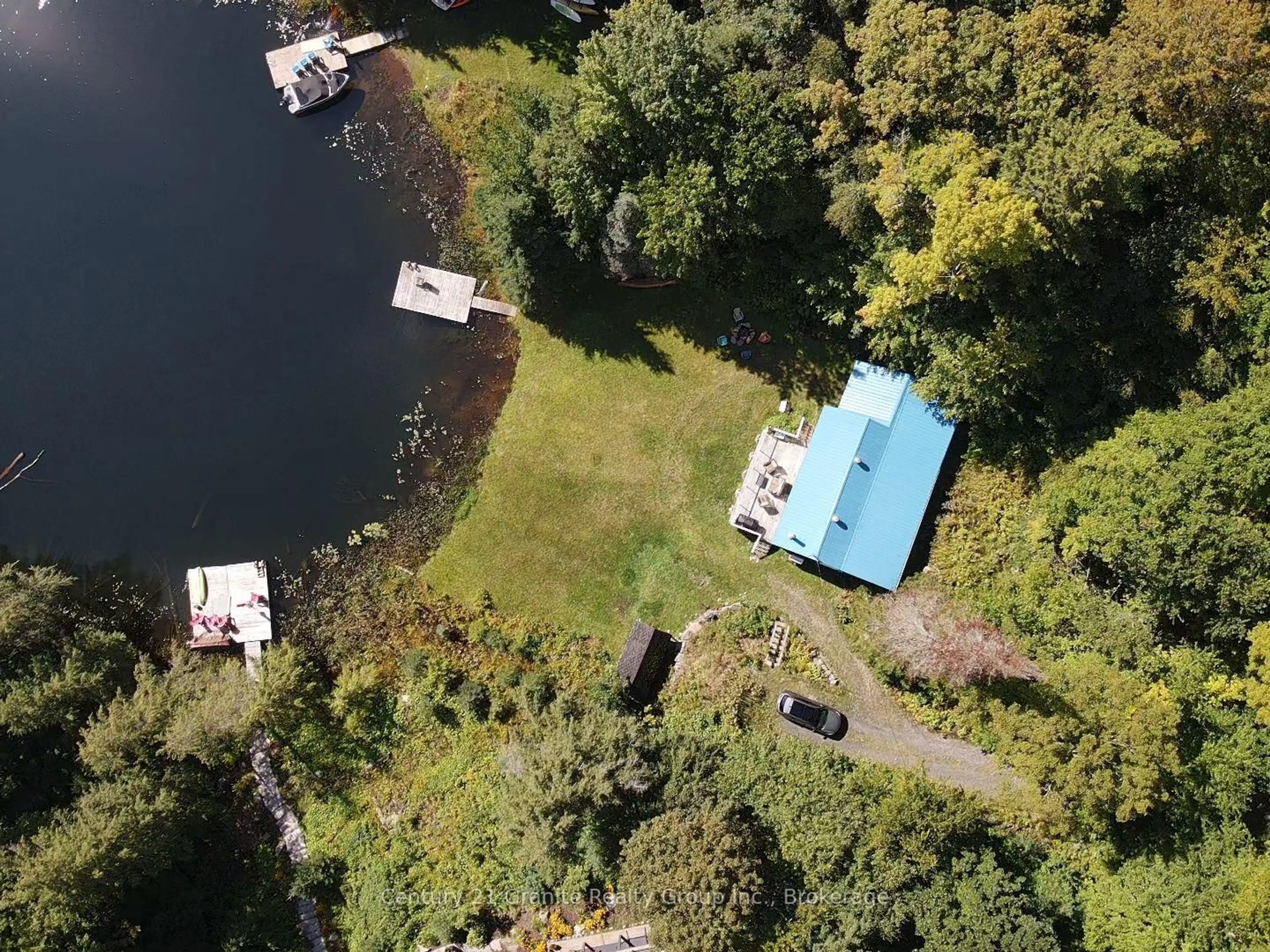 A pic from outside/outdoor area/front of a property/back of a property/a pic from drone, water/lake/river/ocean view for 1292 Bitter Lake Rd, Dysart et al Ontario K0M 1S0