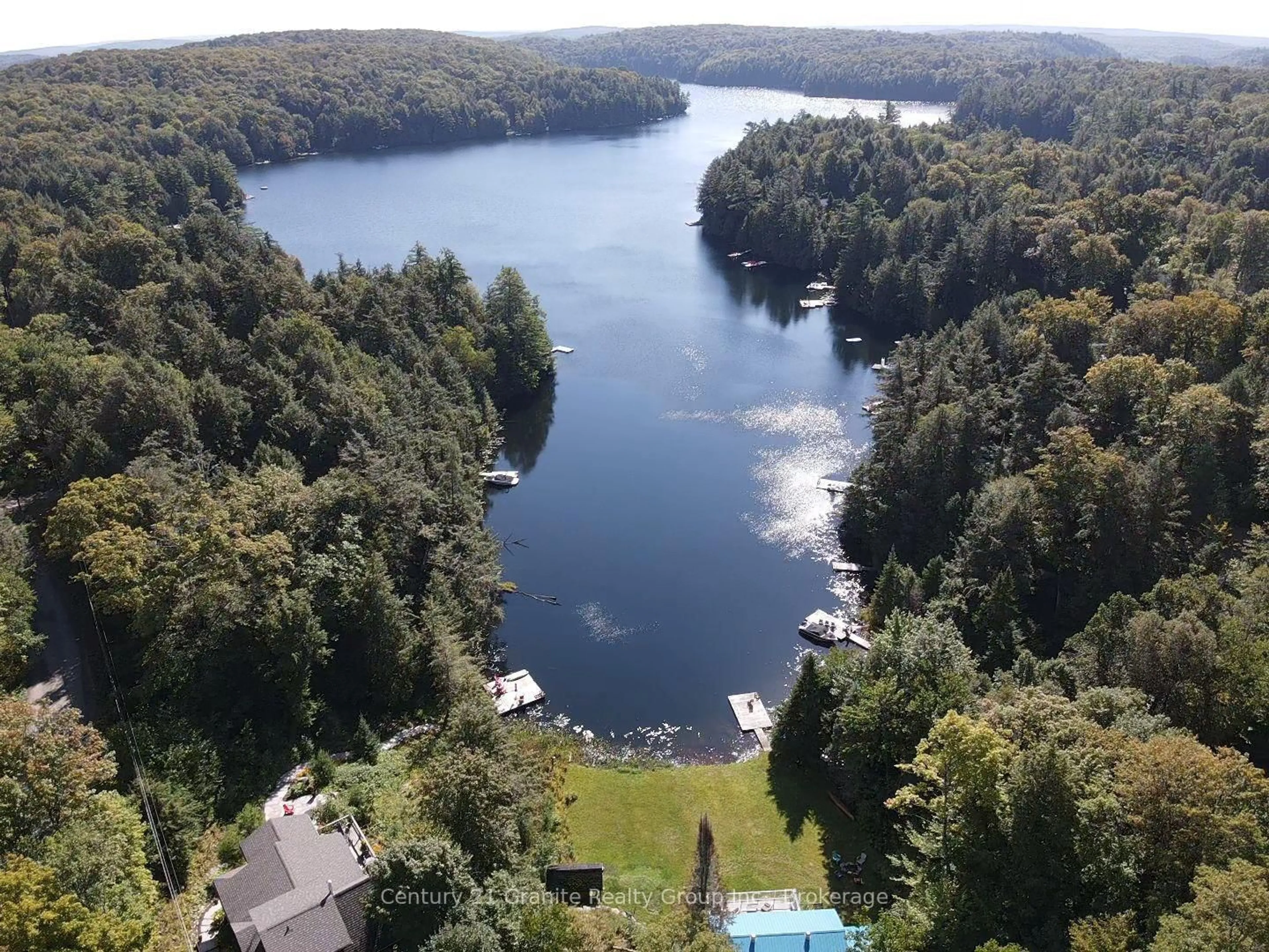 A pic from outside/outdoor area/front of a property/back of a property/a pic from drone, water/lake/river/ocean view for 1292 Bitter Lake Rd, Dysart et al Ontario K0M 1S0