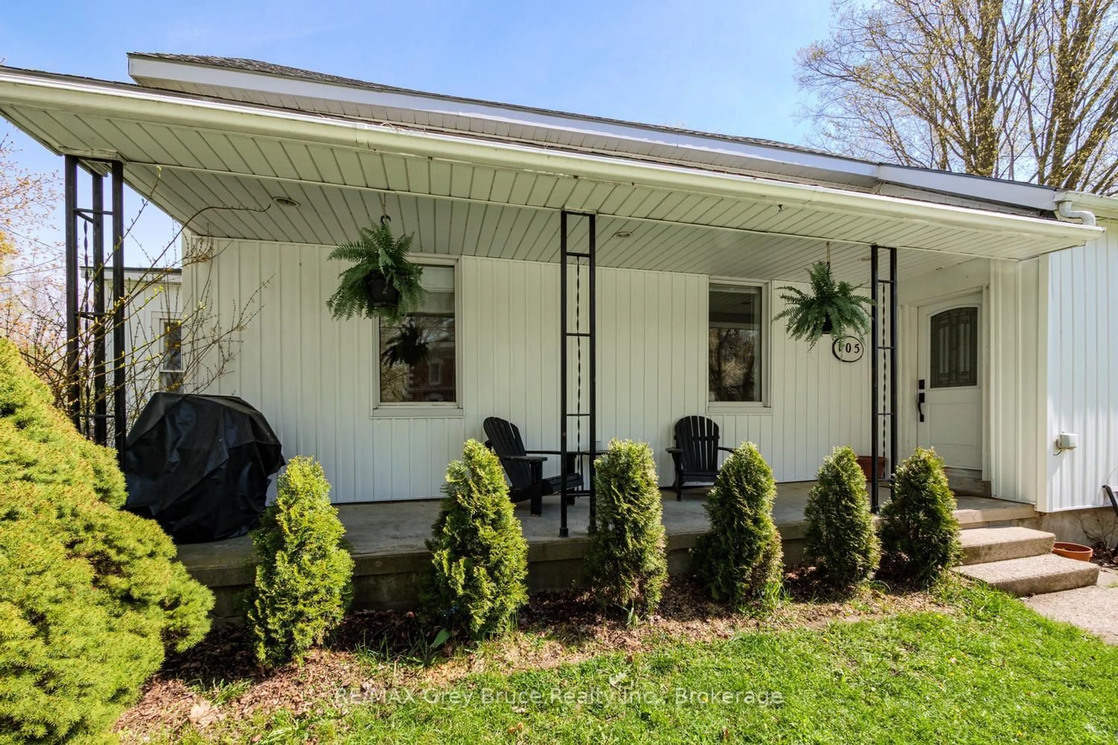 Home with vinyl exterior material, street for 105 Main St, Arran-Elderslie Ontario N0H 2N0