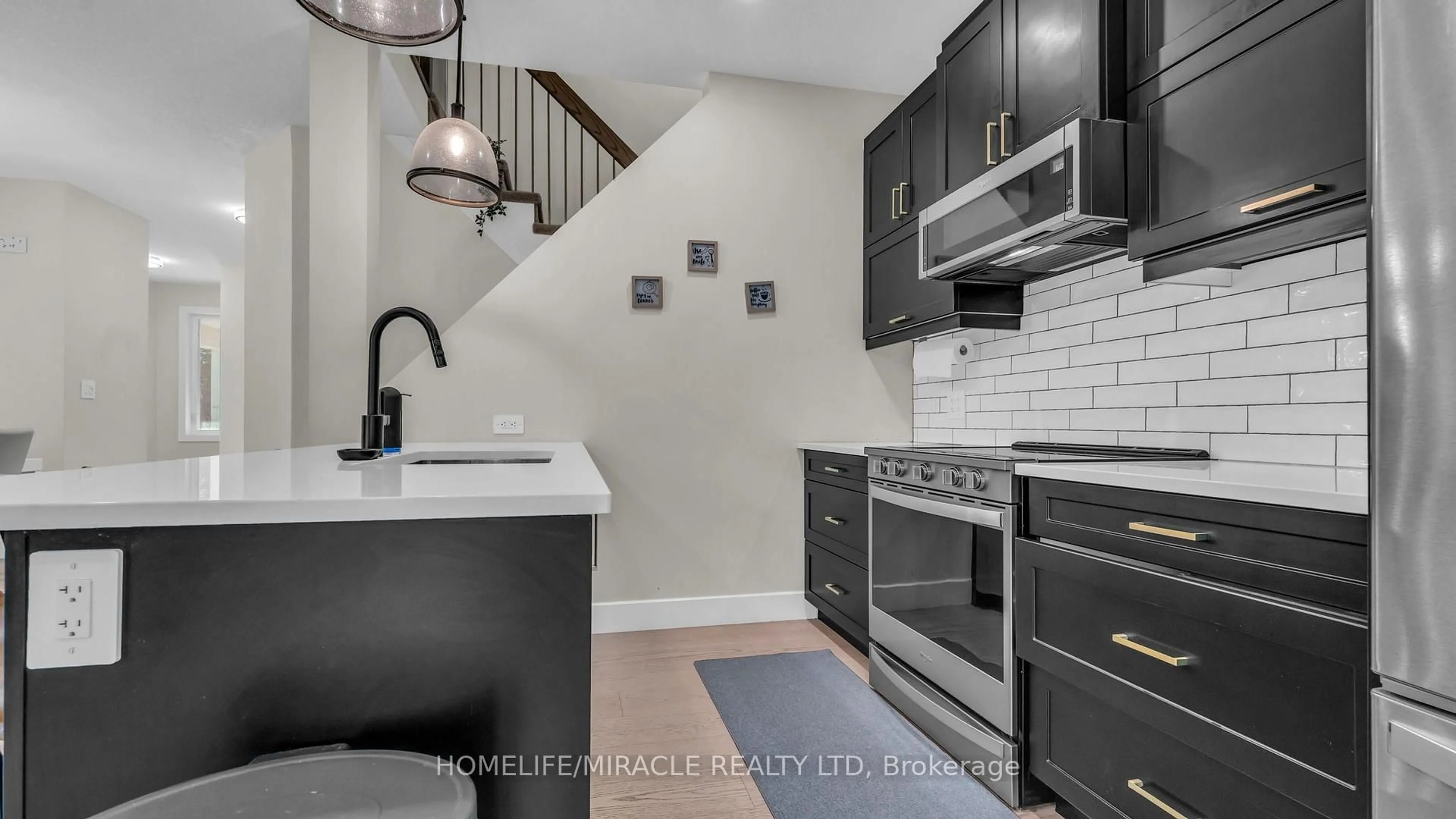 Open concept kitchen, ceramic/tile floor for 1195 Riverside Dr #2, London North Ontario N6H 0K4