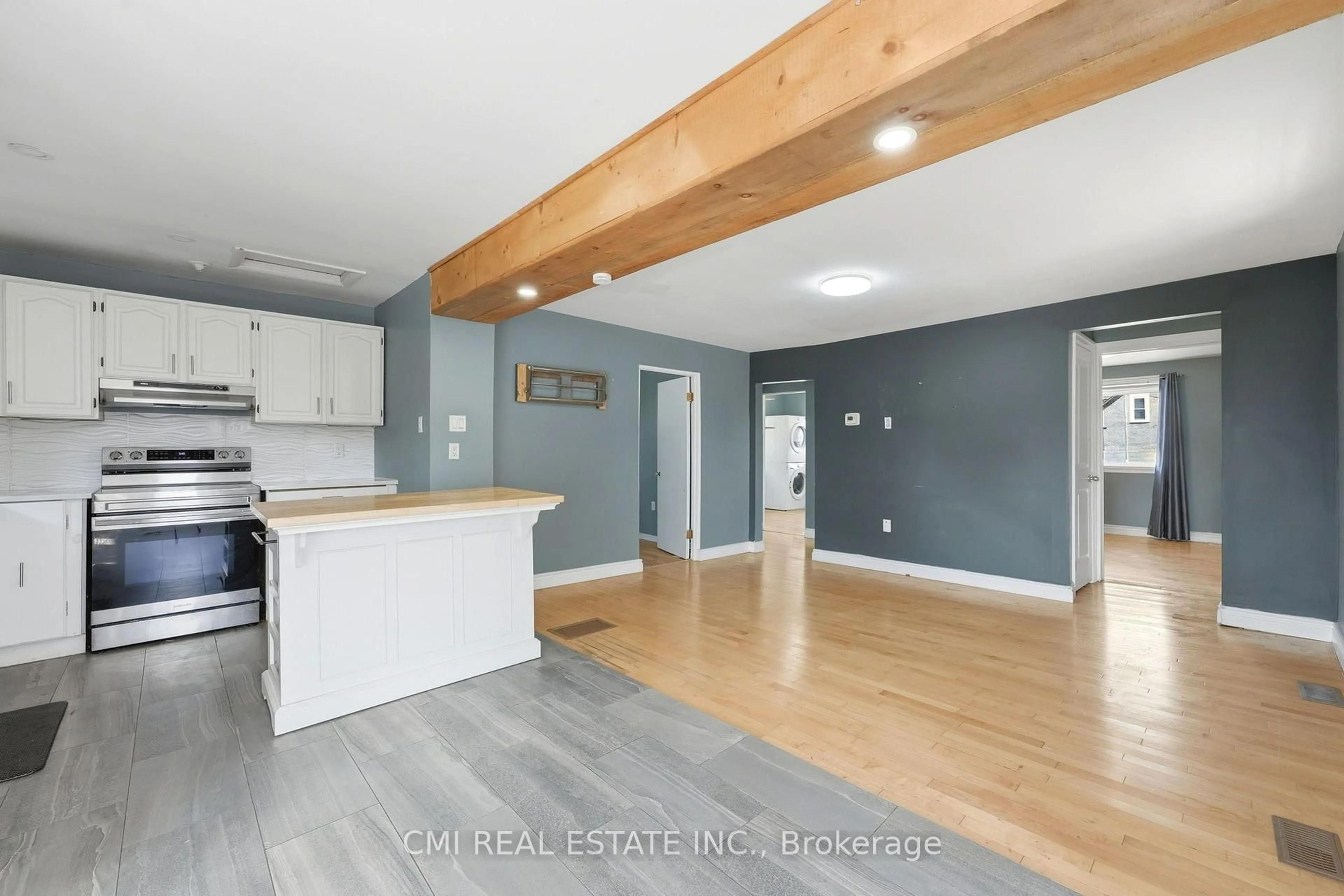 Open concept kitchen, wood/laminate floor for 355 Joffre Ave, Renfrew Ontario K7V 3L6
