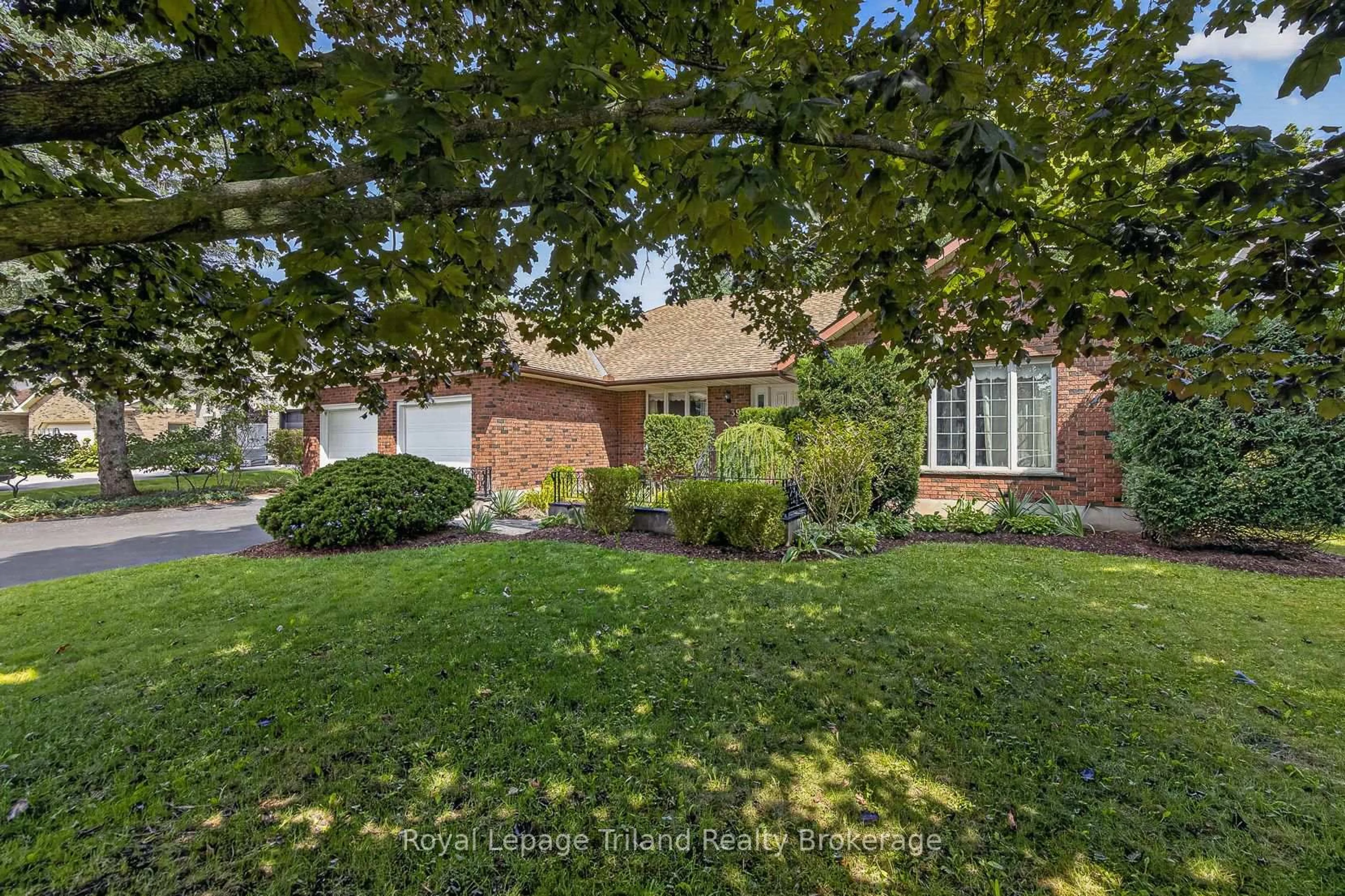Home with brick exterior material, street for 39 Clear Valley Dr, Tillsonburg Ontario N4G 4Y7