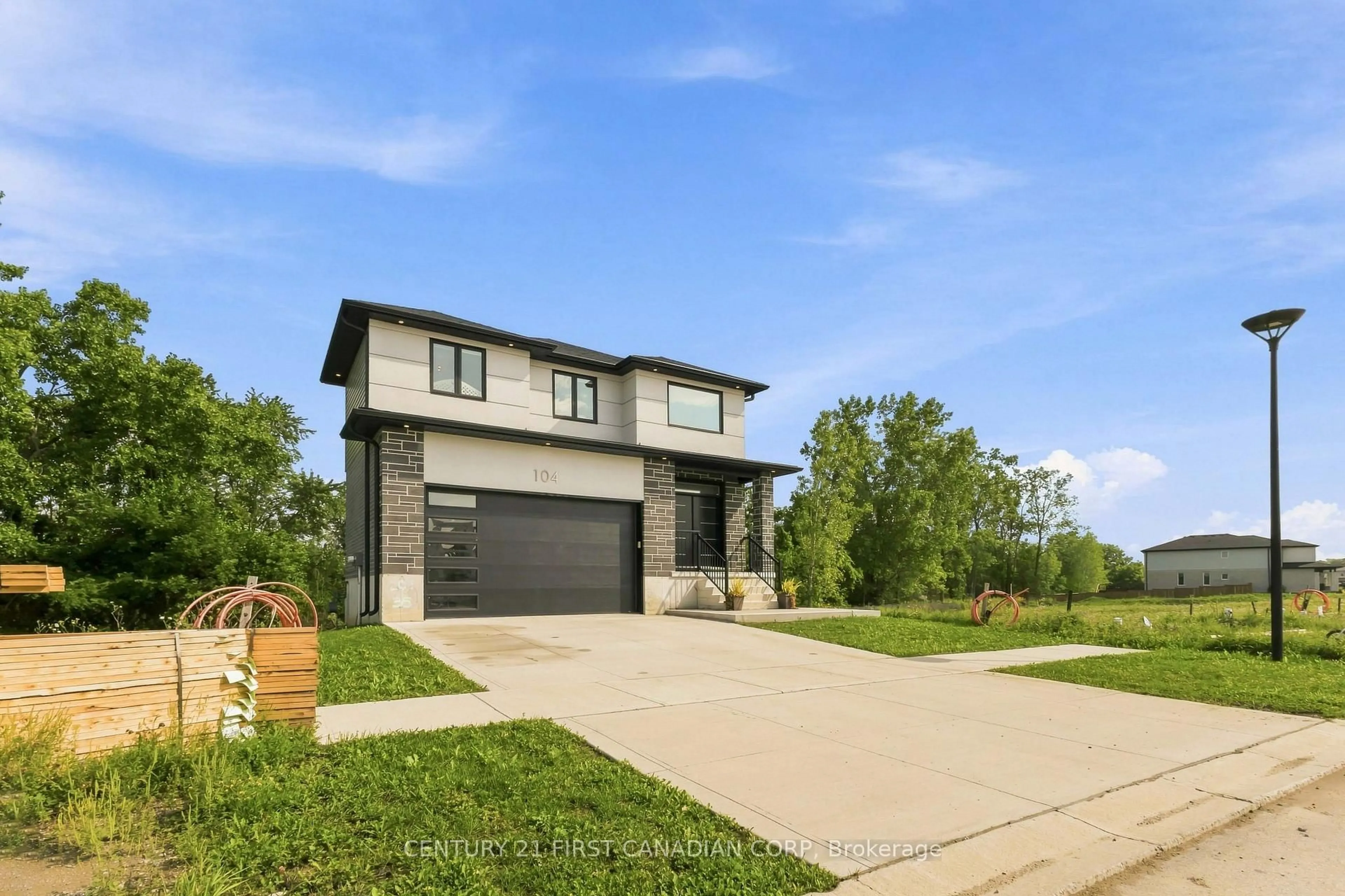 Home with brick exterior material, street for 104 GREENE St, South Huron Ontario N0M 1S2