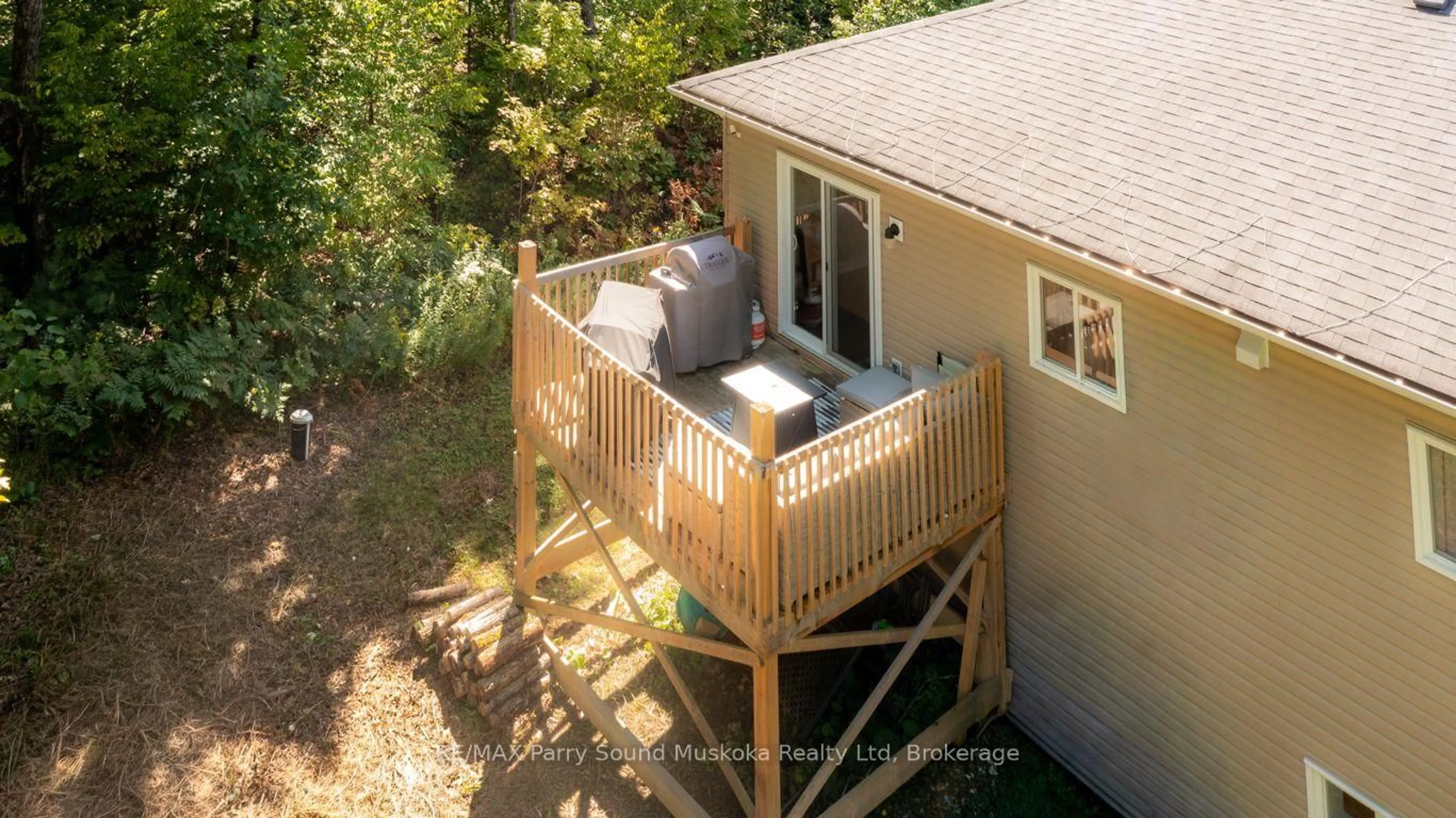 A pic from outside/outdoor area/front of a property/back of a property/a pic from drone, water/lake/river/ocean view for 290 RANKIN LAKE Rd, Seguin Ontario P2A 2W8