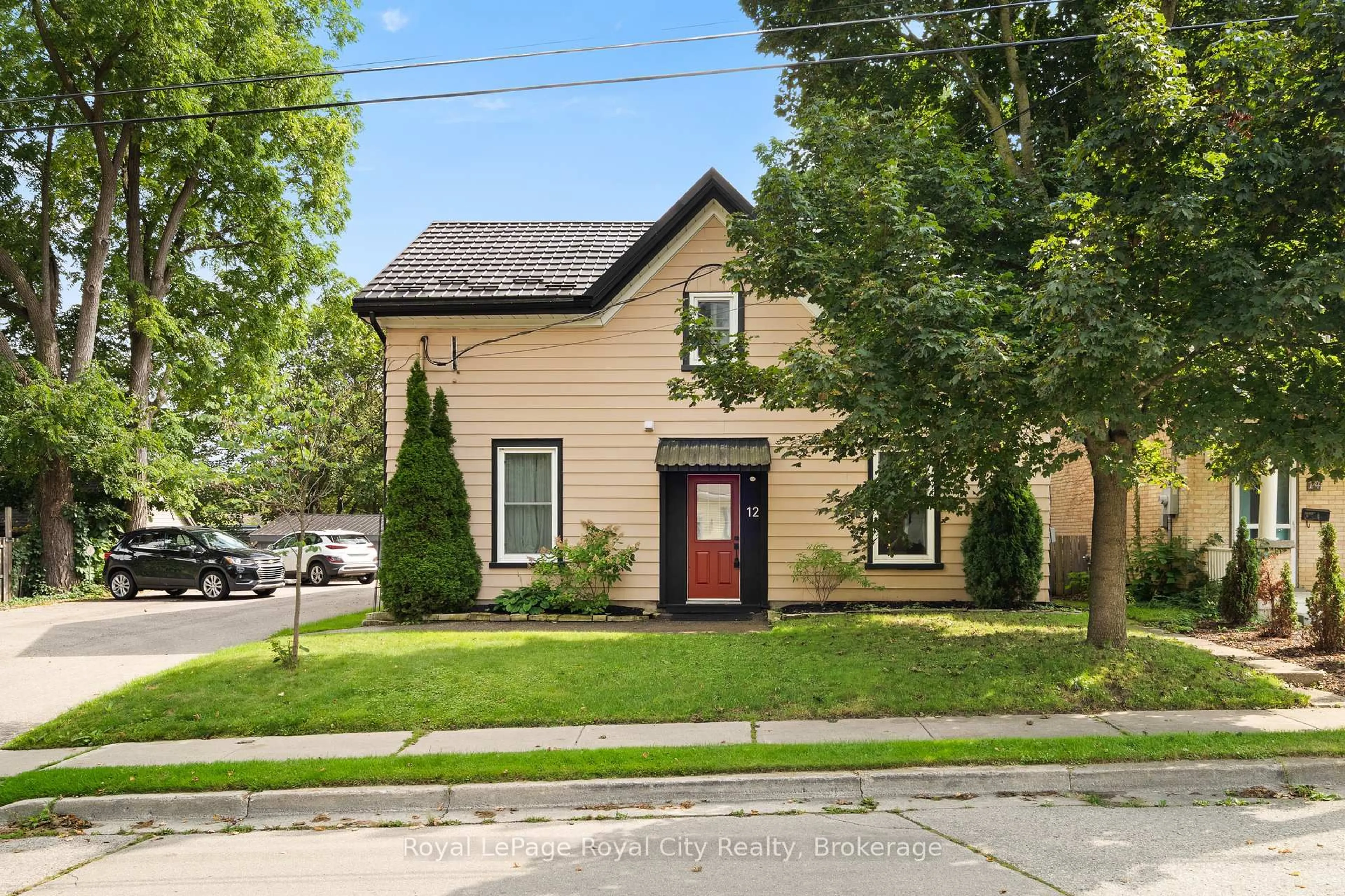 Home with brick exterior material, street for 12 Foster Ave, Guelph Ontario N1H 3B3