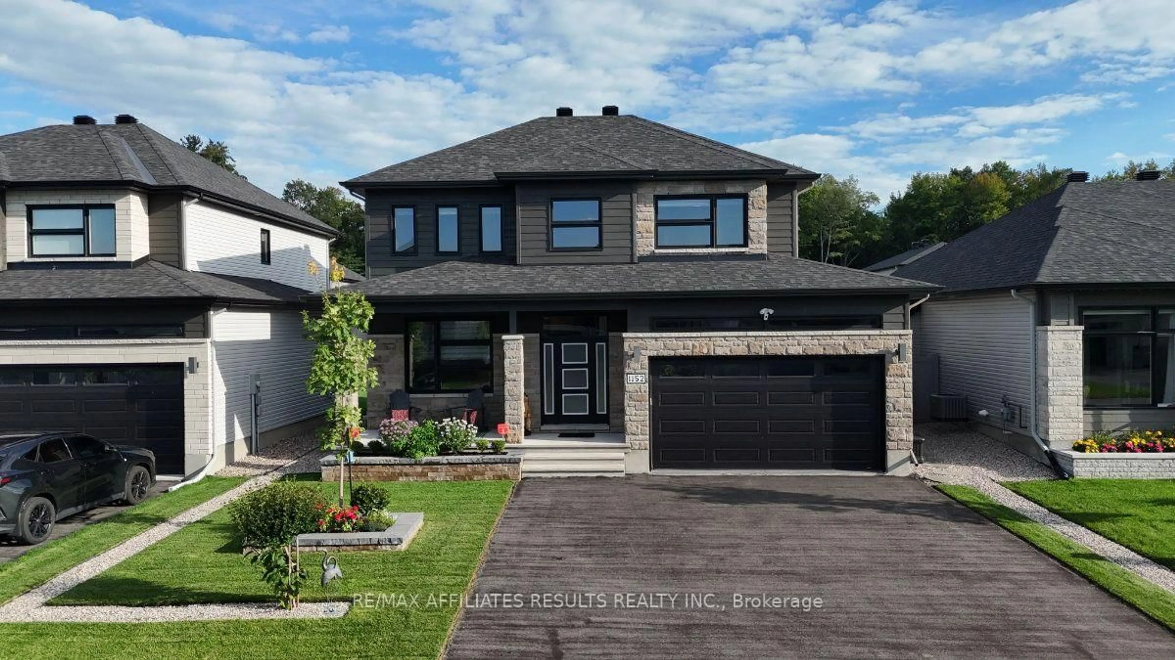 Home with brick exterior material, street for 1152 Avignon St, Russell Ontario K0A 1W0