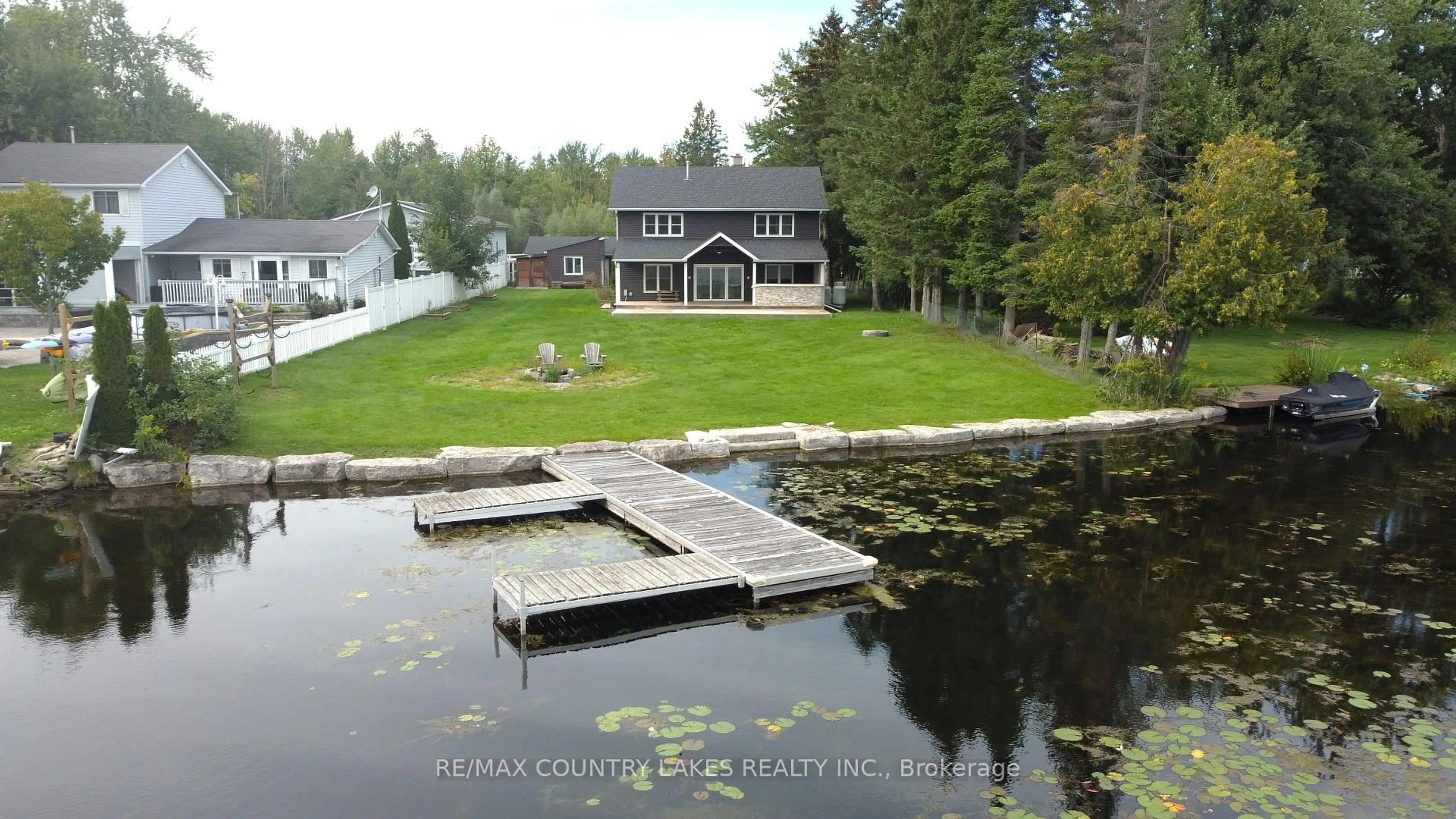 A pic from outside/outdoor area/front of a property/back of a property/a pic from drone, water/lake/river/ocean view for 15 Trent View Rd, Kawartha Lakes Ontario K0M 2B0