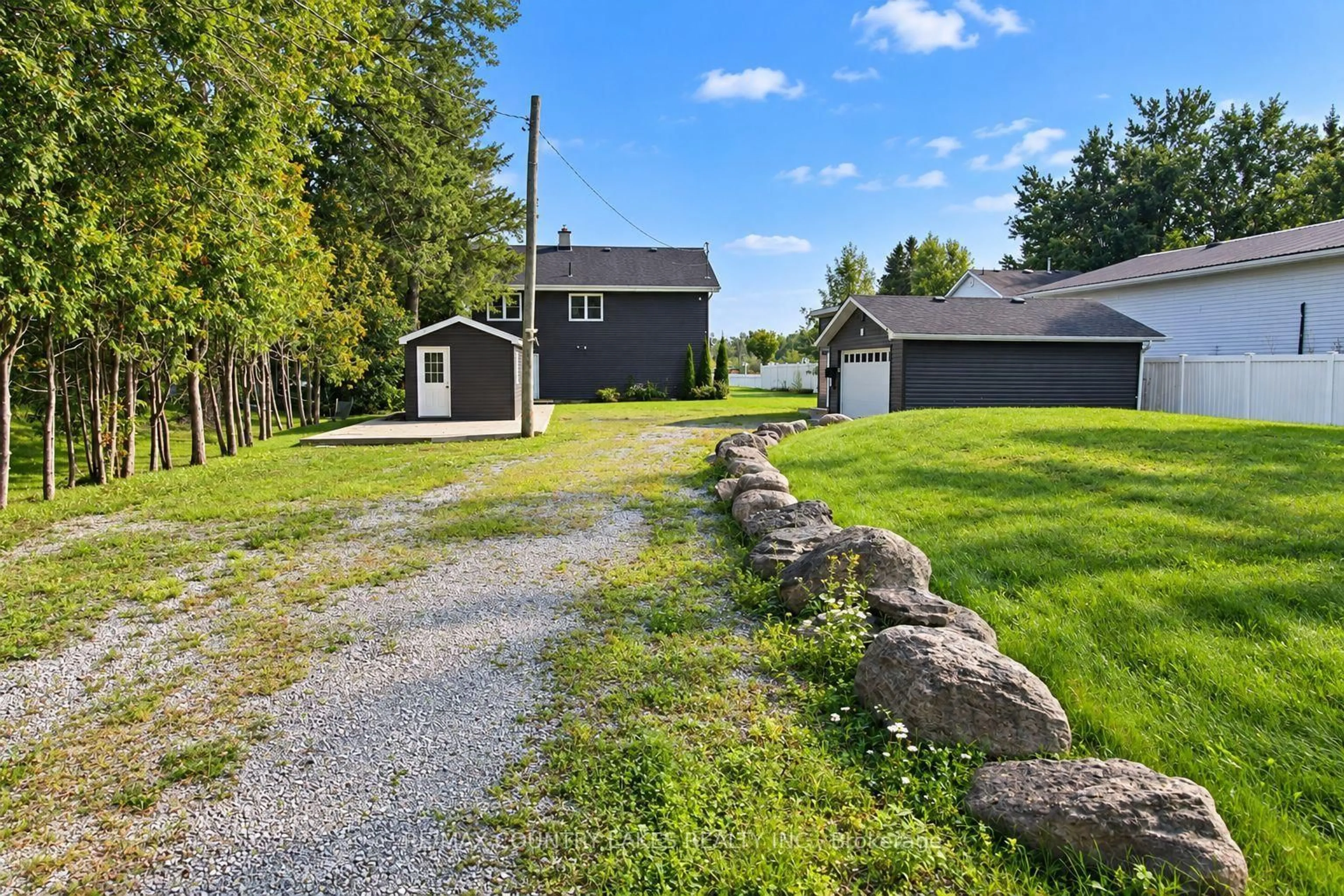 A pic from outside/outdoor area/front of a property/back of a property/a pic from drone, unknown for 15 Trent View Rd, Kawartha Lakes Ontario K0M 2B0