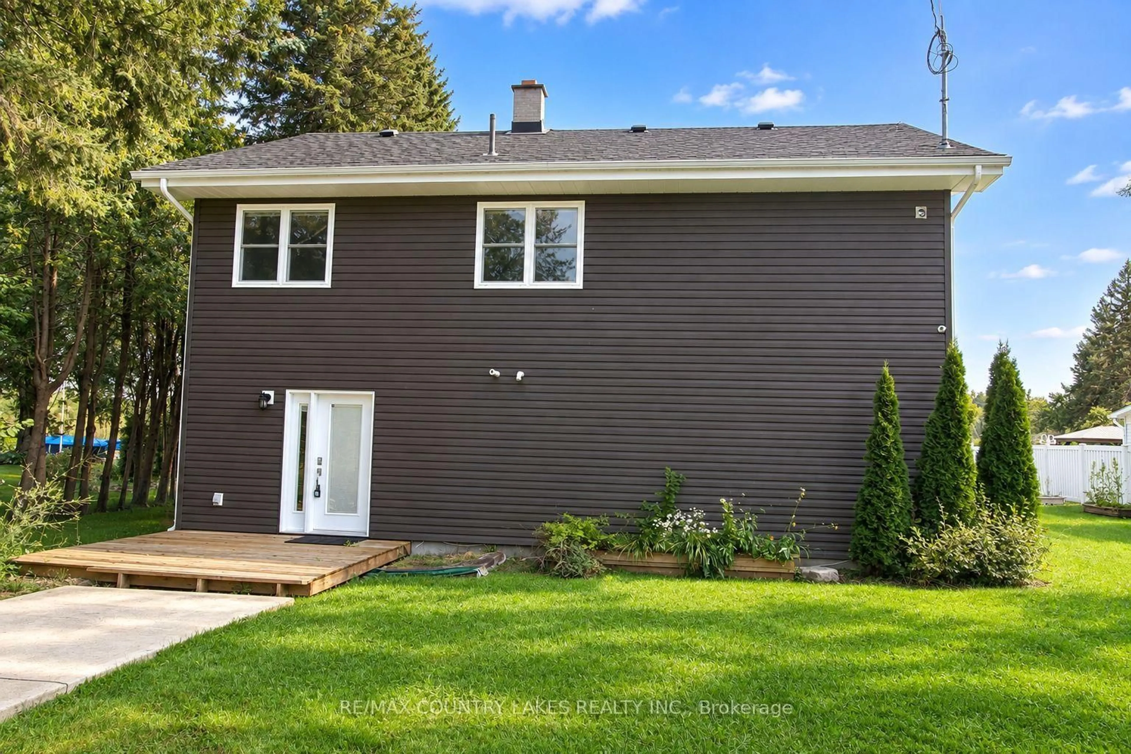 Home with vinyl exterior material, street for 15 Trent View Rd, Kawartha Lakes Ontario K0M 2B0