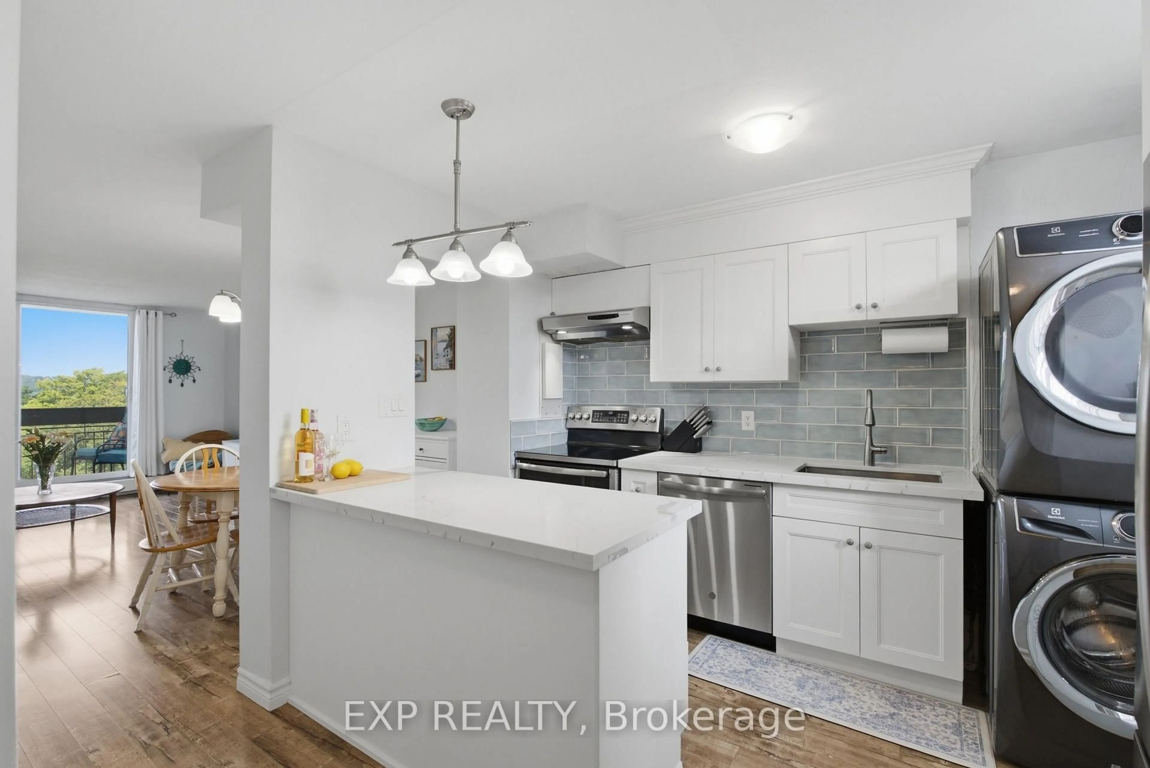 Open concept kitchen, ceramic/tile floor for 350 Quigley Rd #644, Hamilton Ontario L8K 5N2
