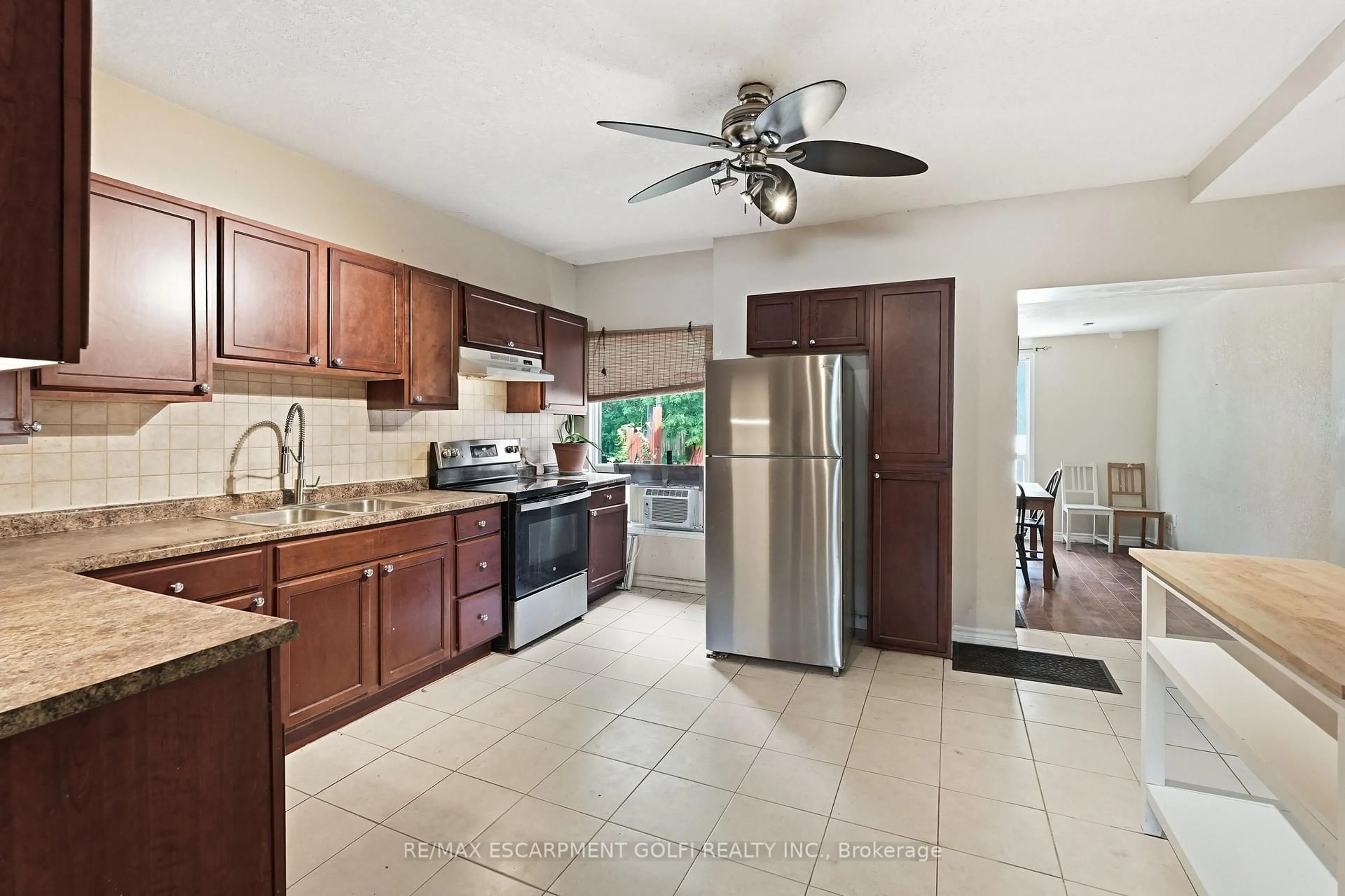 Open concept kitchen, ceramic/tile floor for 26 Niagara St, Hamilton Ontario L8L 6A2