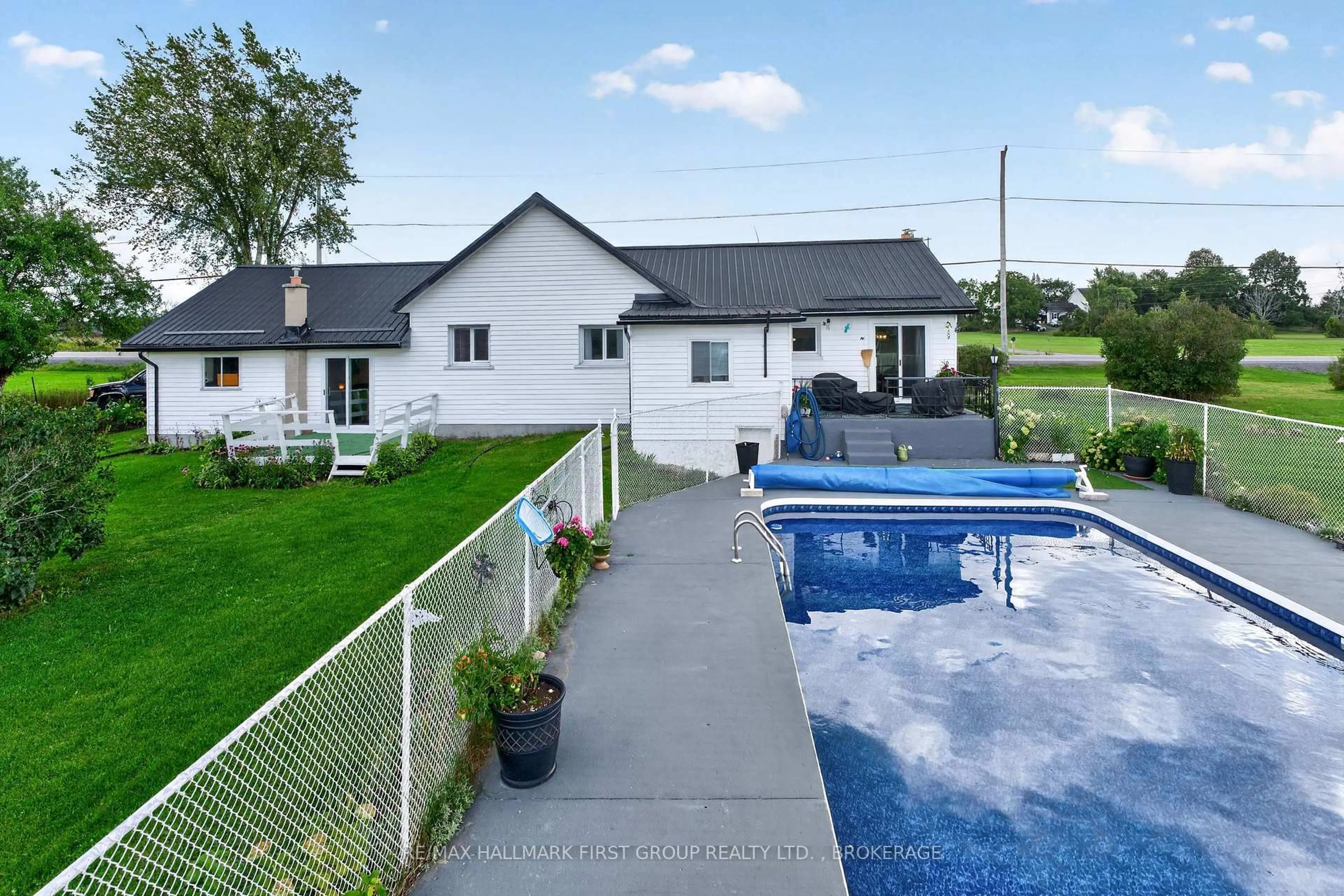 A pic from outside/outdoor area/front of a property/back of a property/a pic from drone, water/lake/river/ocean view for 907 Millhaven Rd, Bissett Creek Ontario K0H 2H0