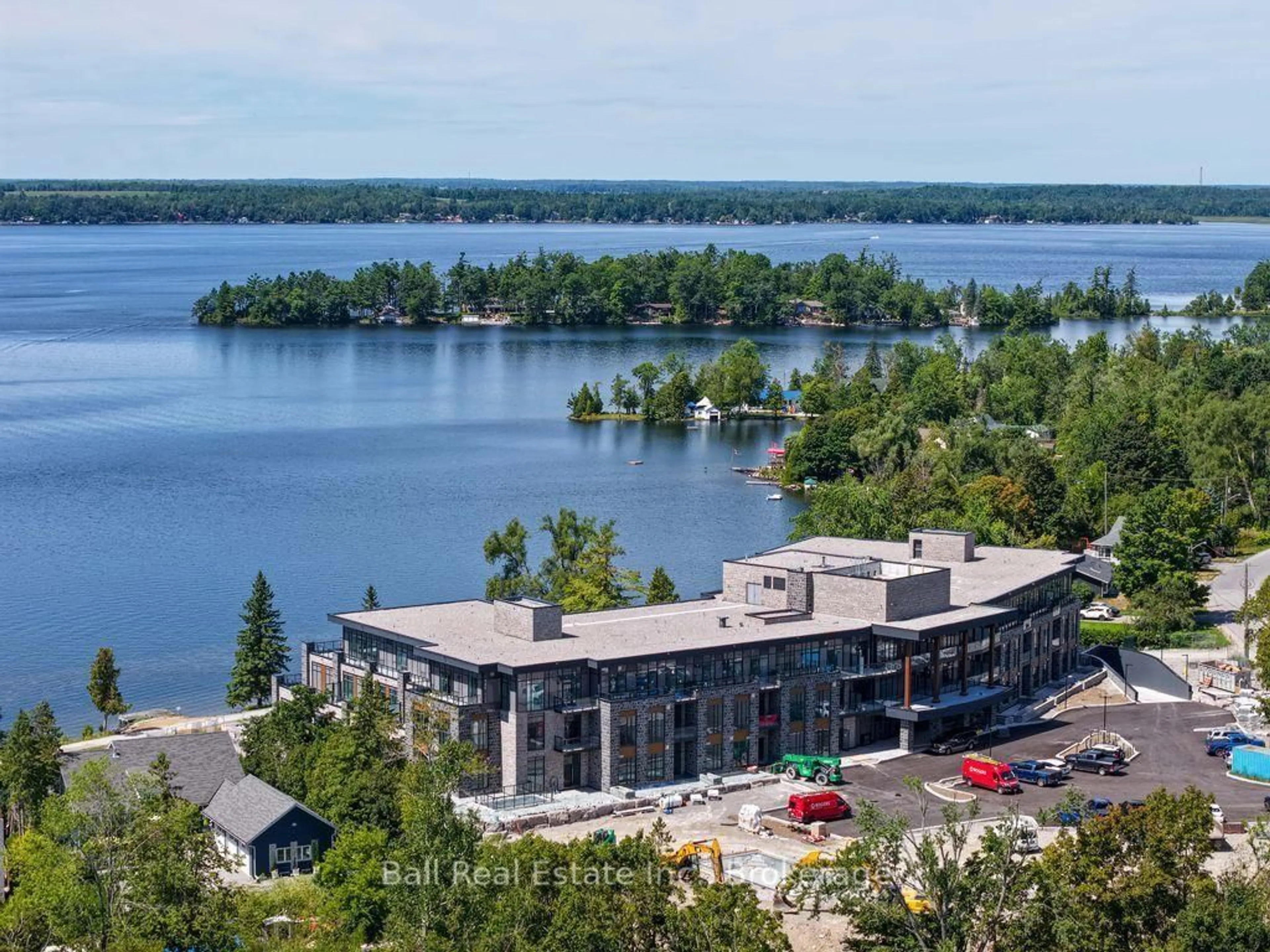 A pic from outside/outdoor area/front of a property/back of a property/a pic from drone, water/lake/river/ocean view for 99 Louisa St #116, Kawartha Lakes Ontario K0M 1N0
