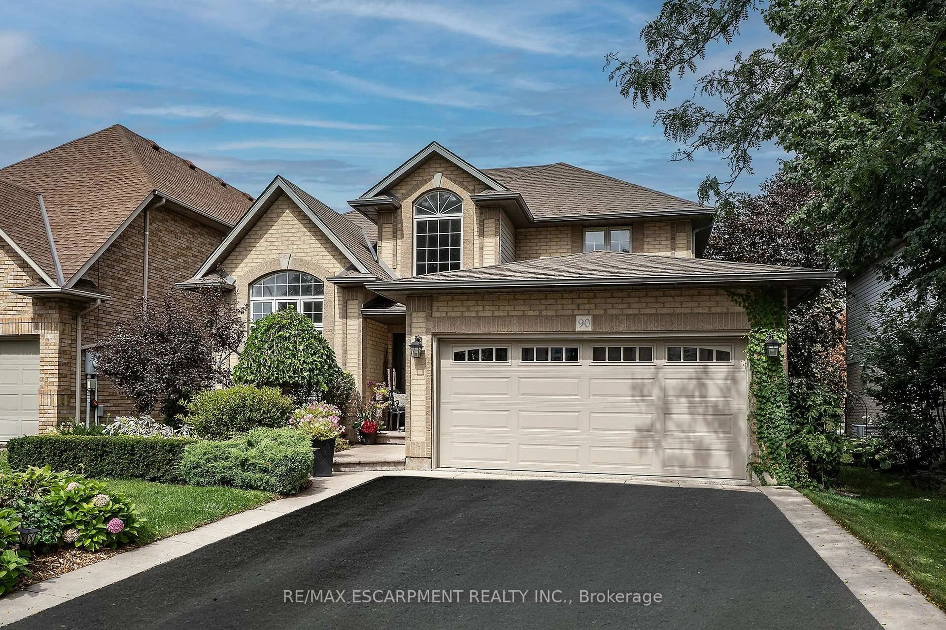 Home with vinyl exterior material, street for 90 Surrey Dr, Hamilton Ontario L9K 1L9