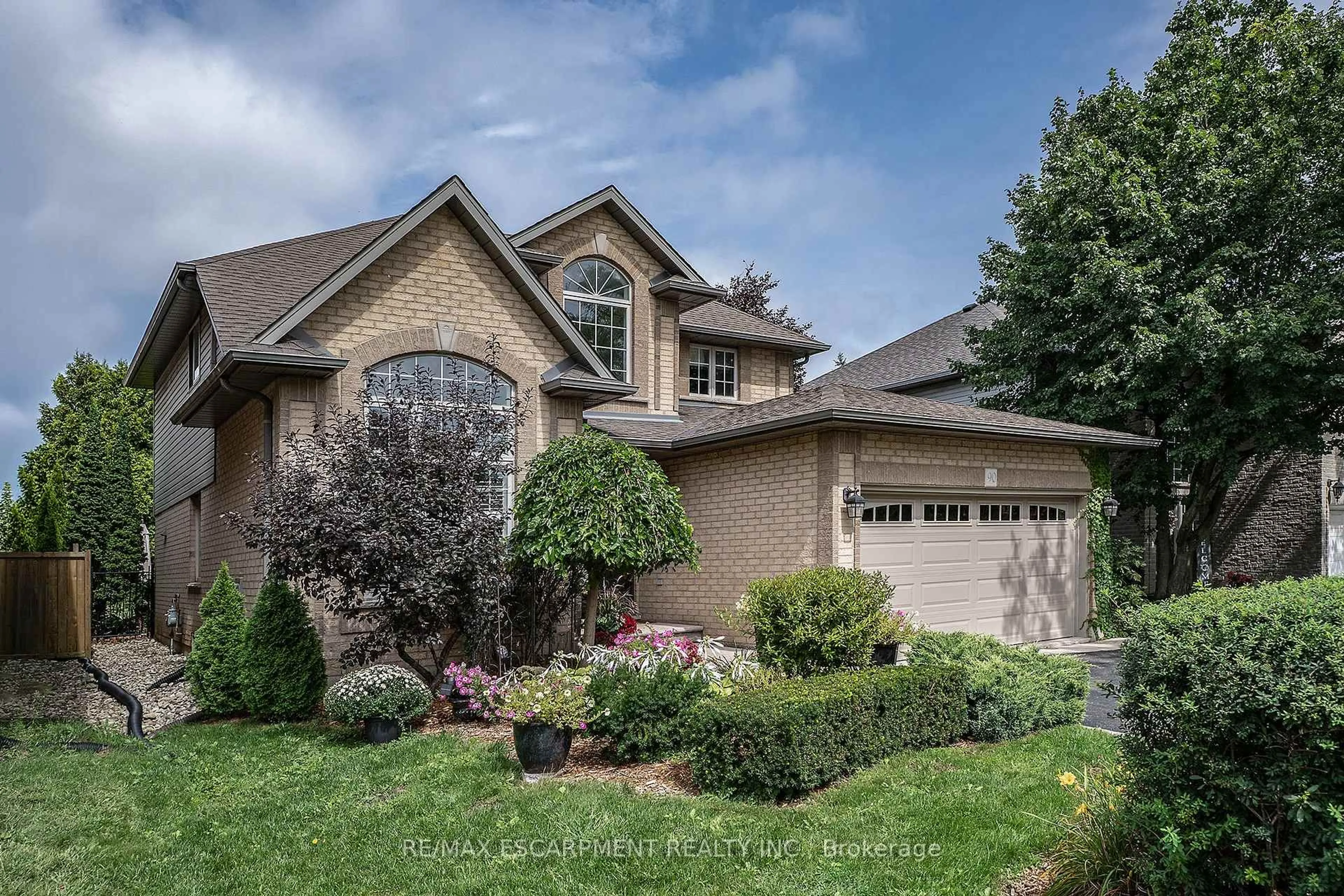 Home with brick exterior material, street for 90 Surrey Dr, Hamilton Ontario L9K 1L9