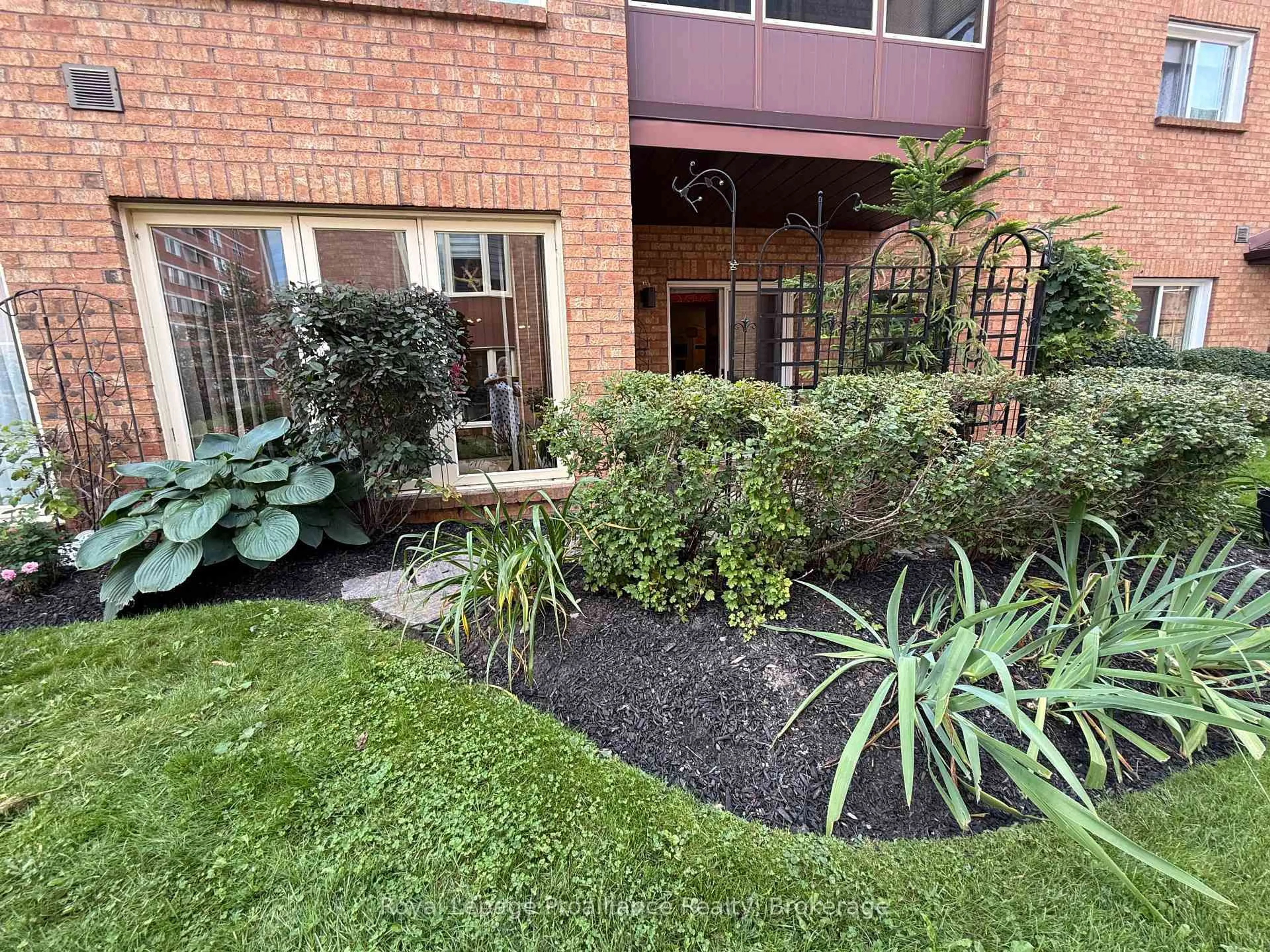 A pic from outside/outdoor area/front of a property/back of a property/a pic from drone, street for 2181 Walker Ave #102, Peterborough Ontario K9L 1T6
