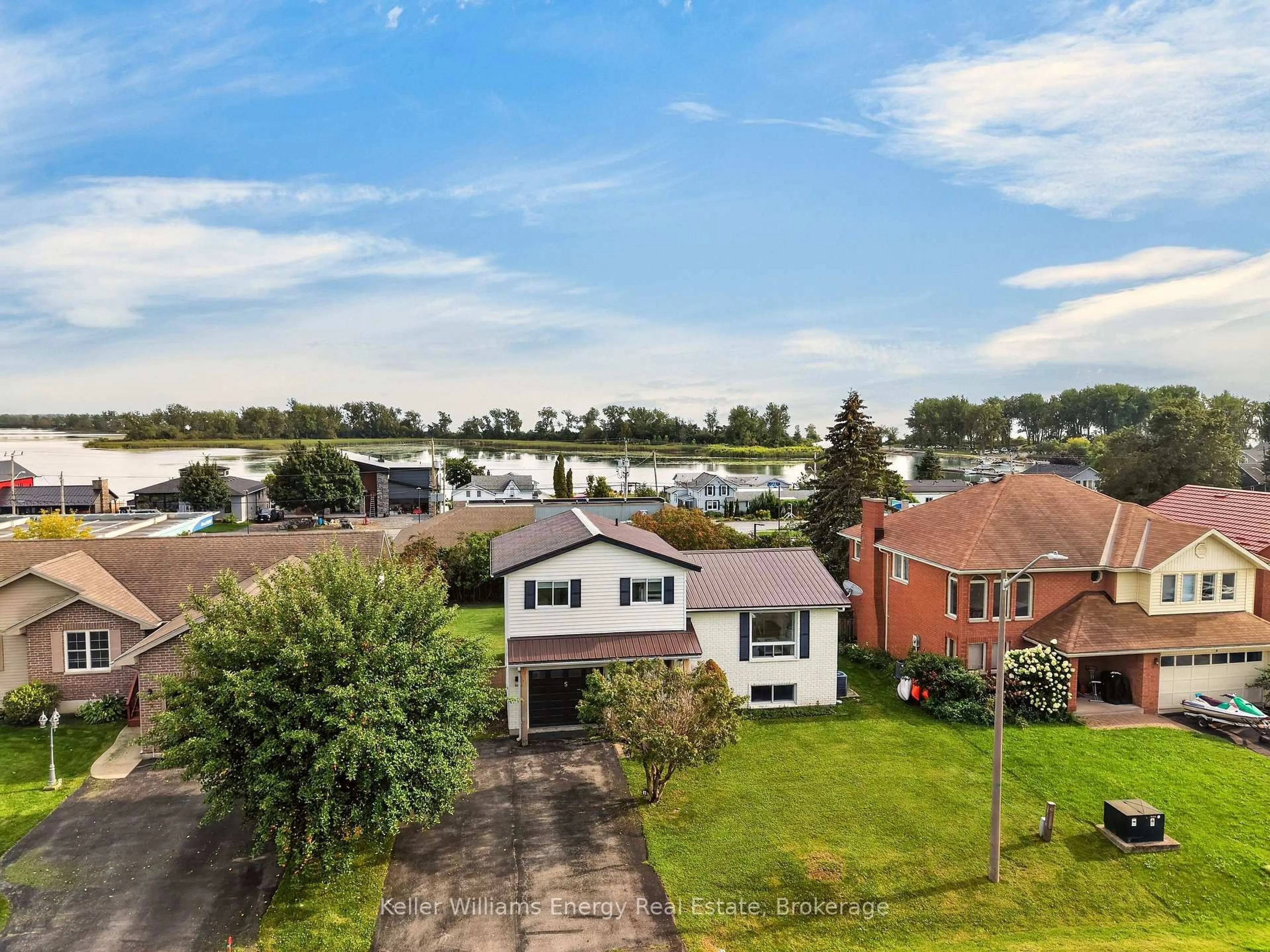 A pic from outside/outdoor area/front of a property/back of a property/a pic from drone, water/lake/river/ocean view for 5 Harbourview Cres, Prince Edward County Ontario K0K 3L0
