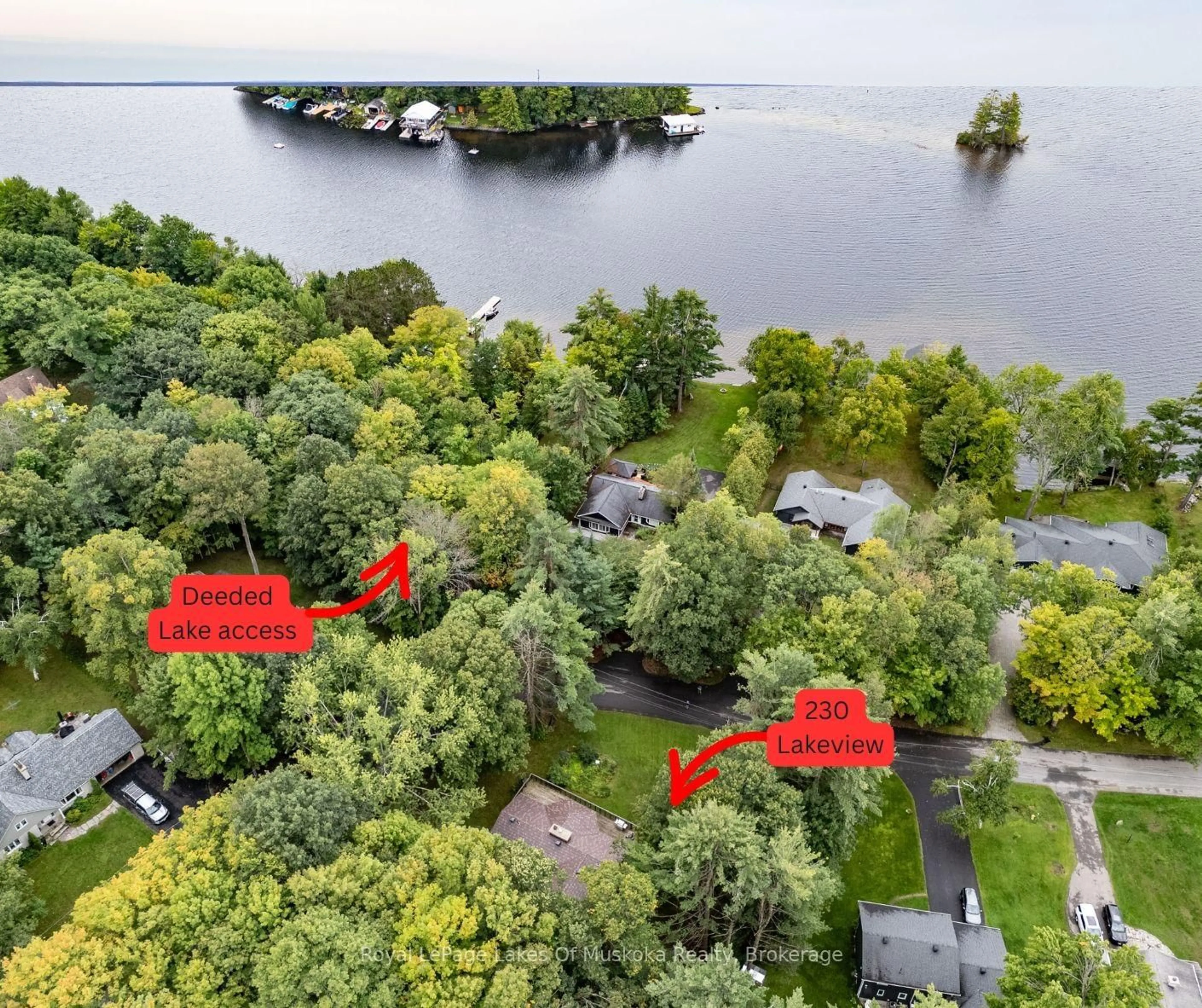 A pic from outside/outdoor area/front of a property/back of a property/a pic from drone, water/lake/river/ocean view for 230 Lakeview Ave, Gravenhurst Ontario P1P 1R4