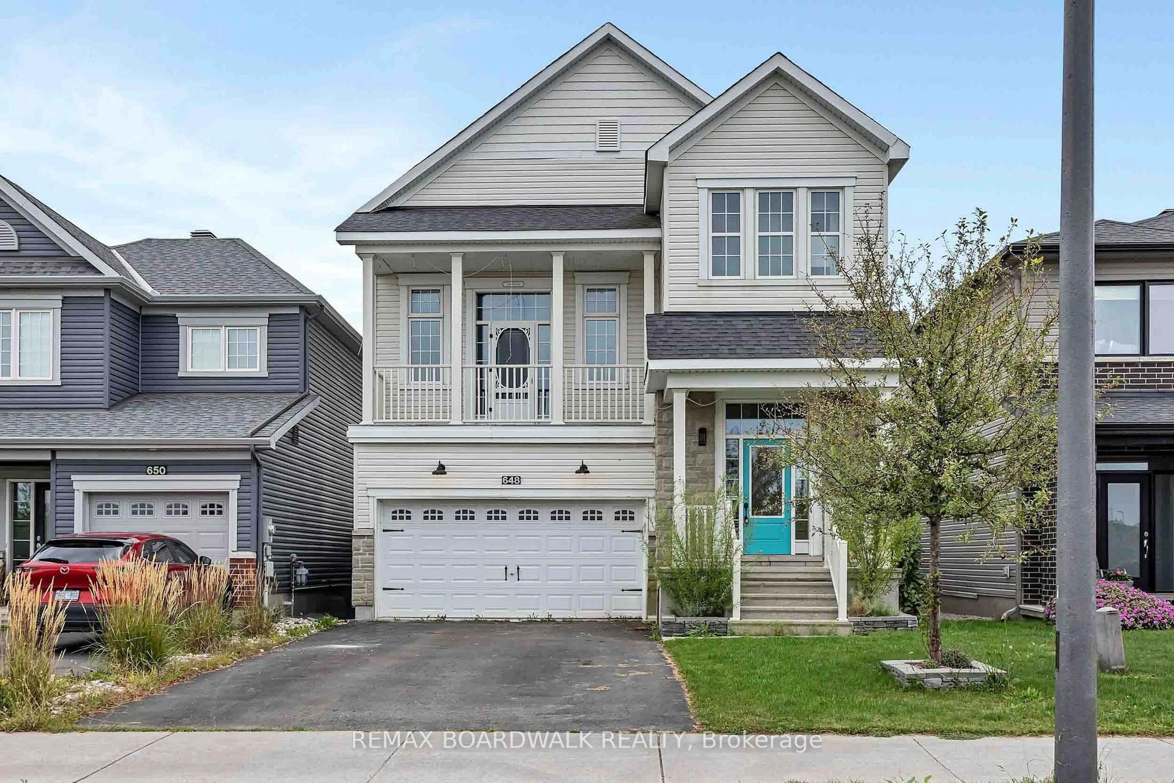 Home with vinyl exterior material, street for 648 Decoeur Dr, Orleans Ontario K4A 1G4