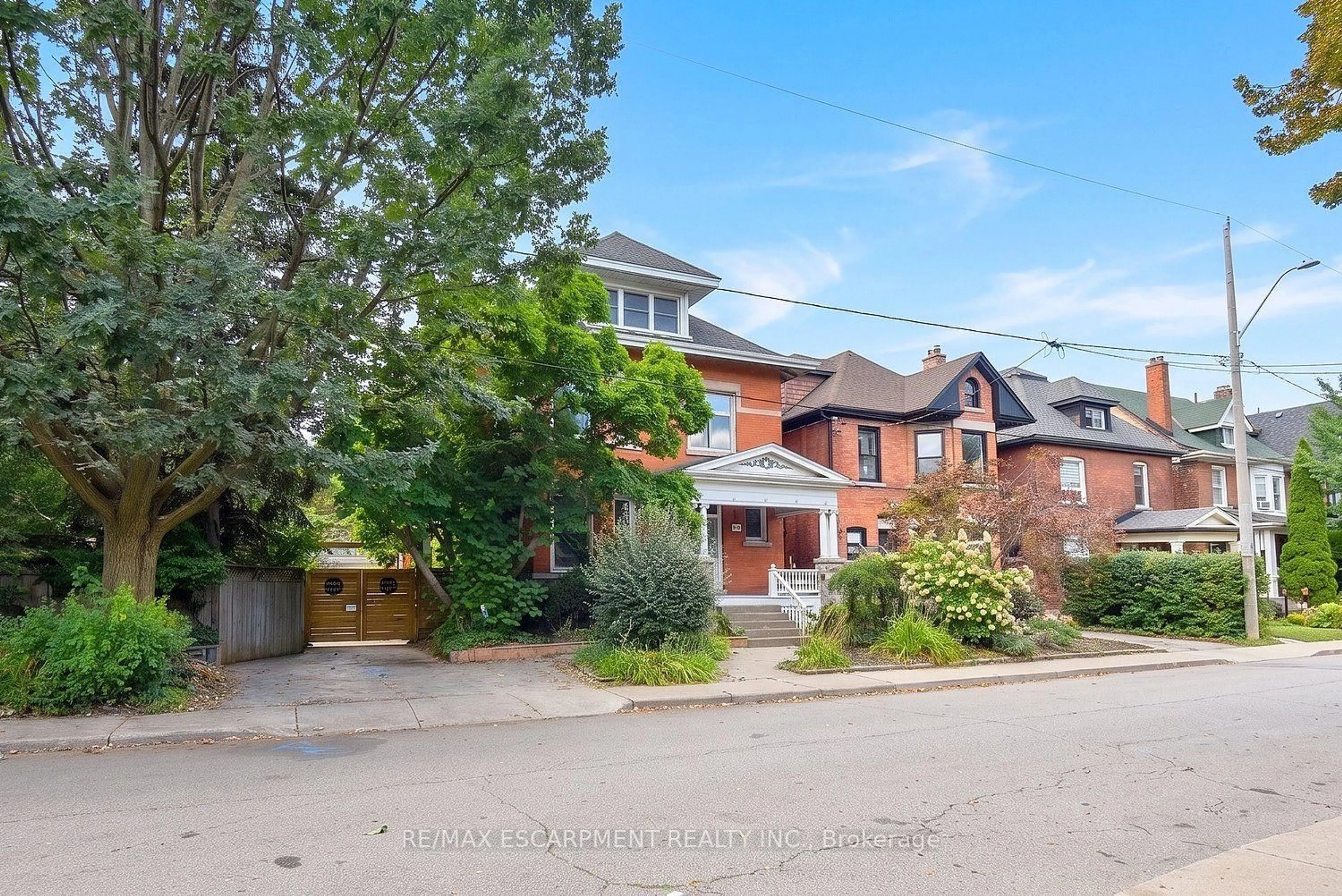 Home with brick exterior material, street for 34 HOLTON Ave, Hamilton Ontario L8M 2L2
