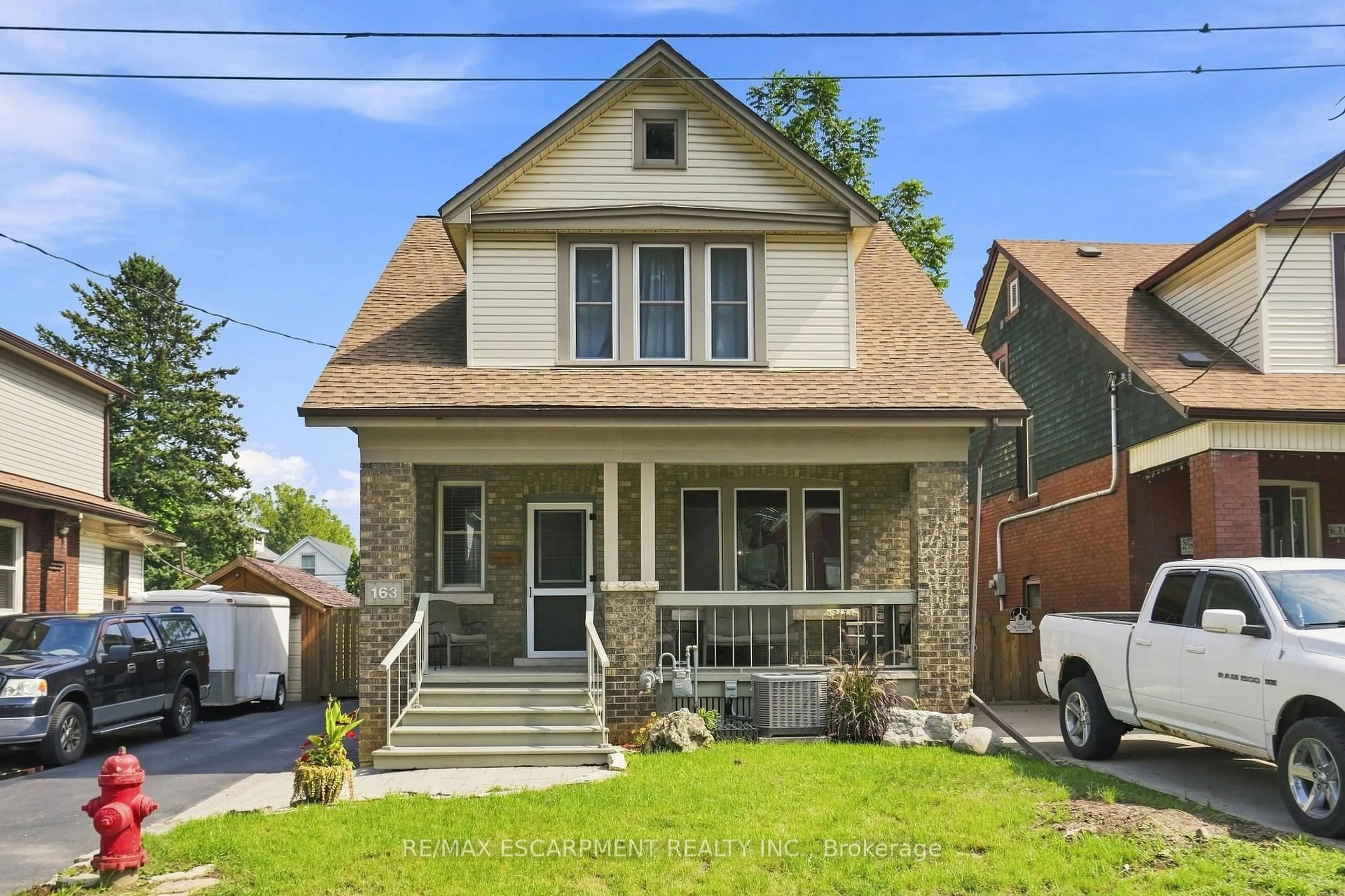 Home with brick exterior material, street for 163 Grosvenor Ave, Hamilton Ontario L8M 3L4