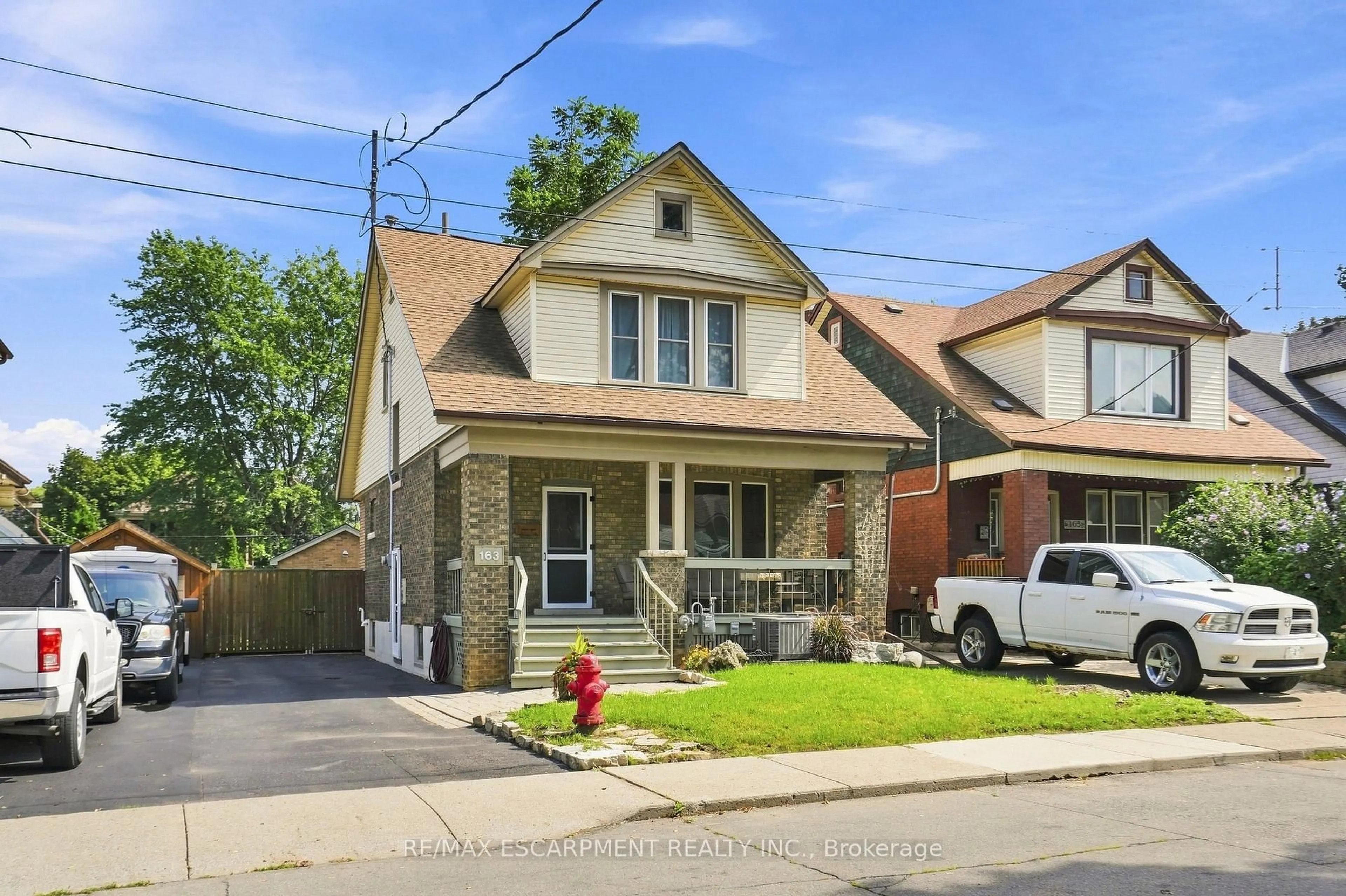Home with brick exterior material, street for 163 Grosvenor Ave, Hamilton Ontario L8M 3L4