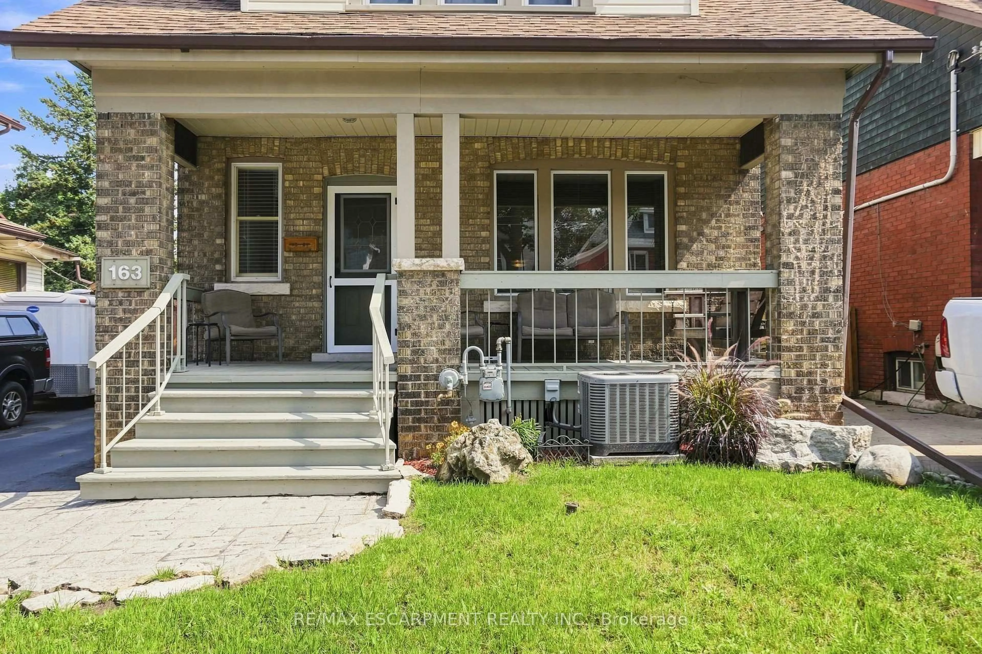 Home with brick exterior material, street for 163 Grosvenor Ave, Hamilton Ontario L8M 3L4