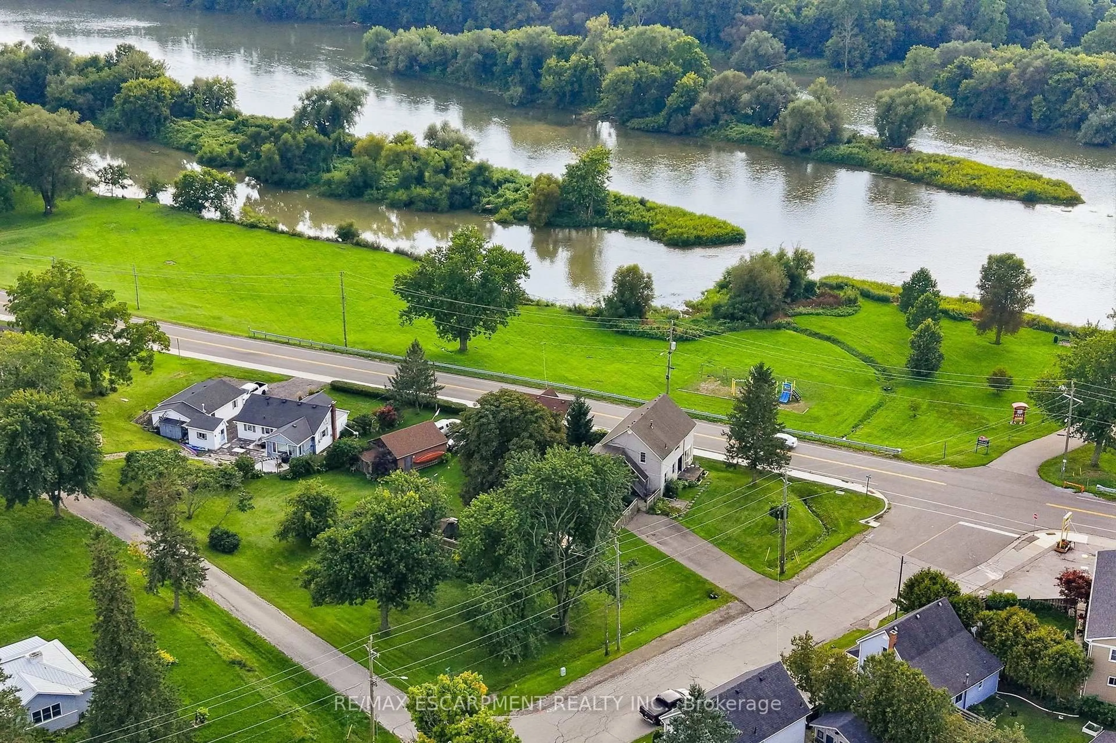 A pic from outside/outdoor area/front of a property/back of a property/a pic from drone, water/lake/river/ocean view for 2 Mill St, Haldimand Ontario N0A 1R0