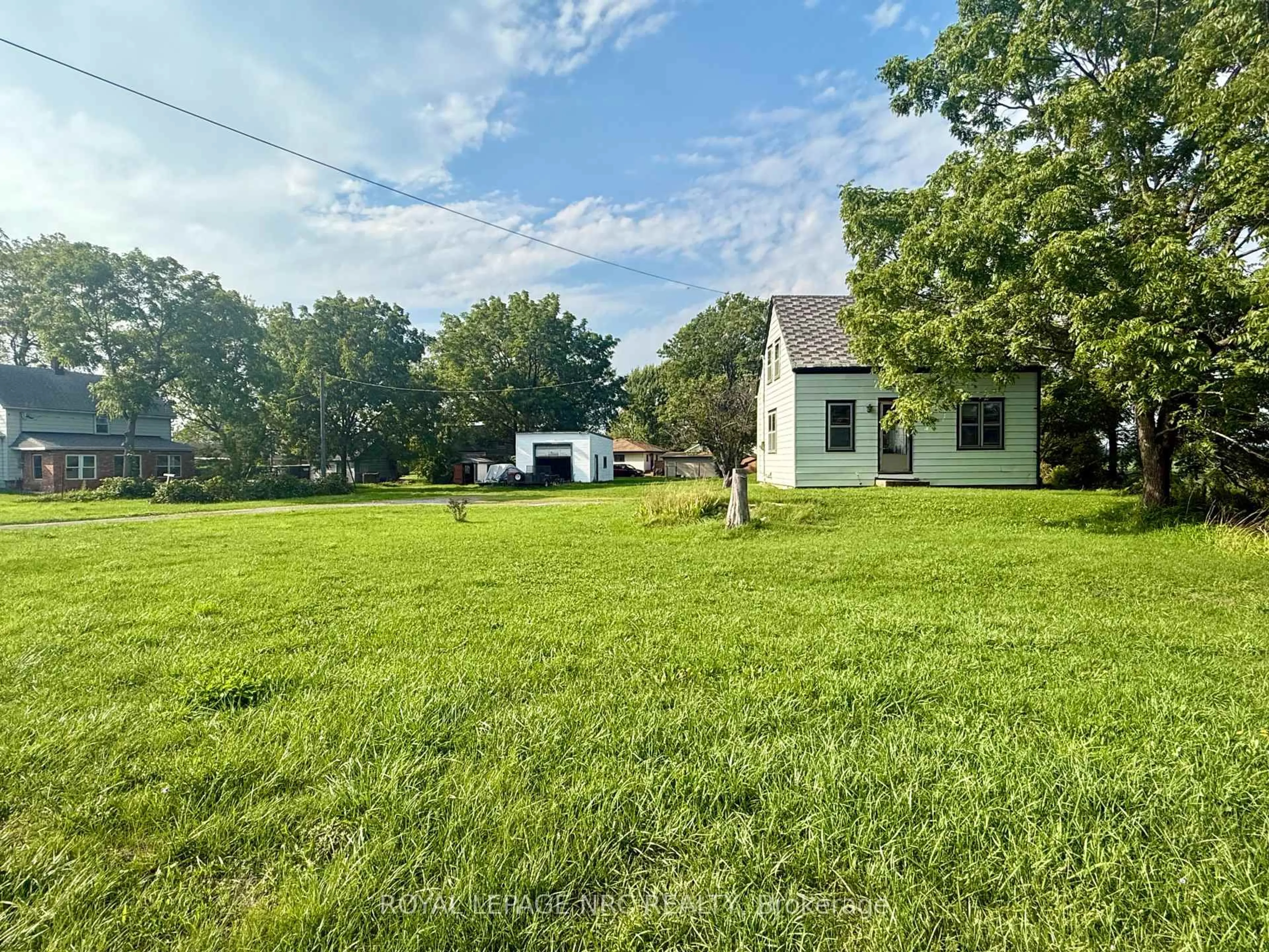 A pic from outside/outdoor area/front of a property/back of a property/a pic from drone, water/lake/river/ocean view for 735 Main St, Port Colborne Ontario L3K 5V4