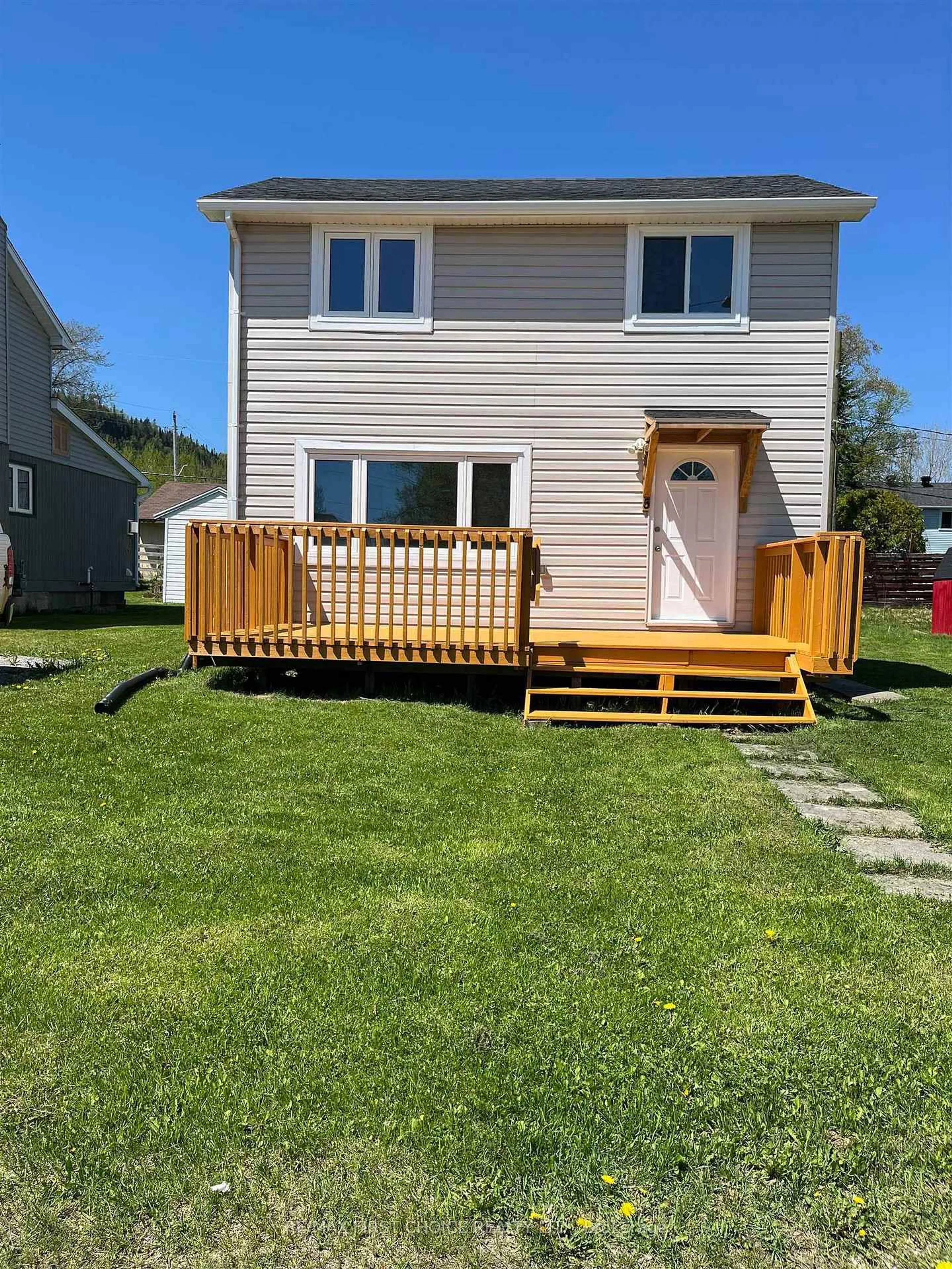 Home with vinyl exterior material, street for 5 Crutchfield Ave, Red Rock Ontario P0T 2P0