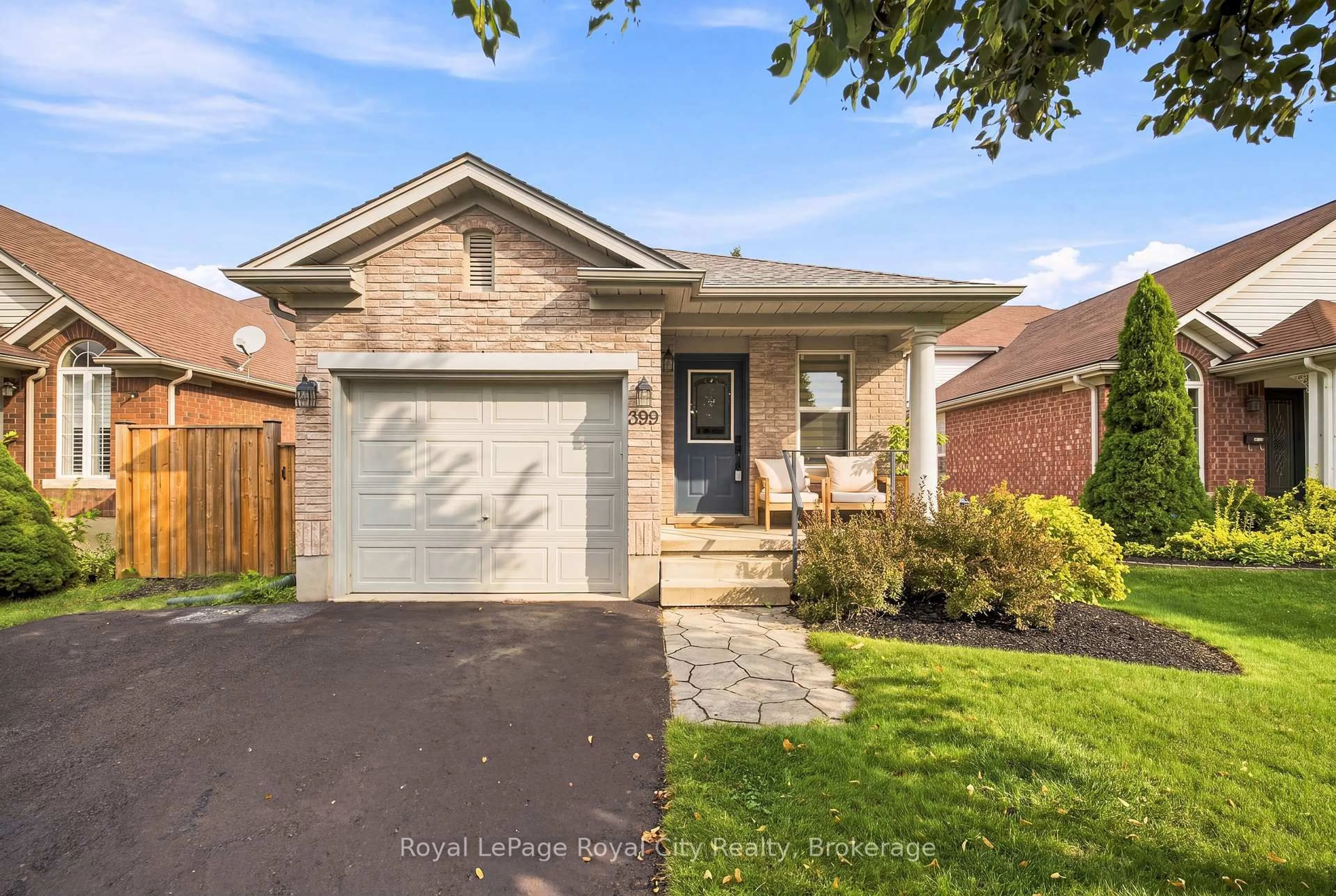 Home with brick exterior material, street for 399 STARWOOD Dr, Guelph Ontario N1E 7A3