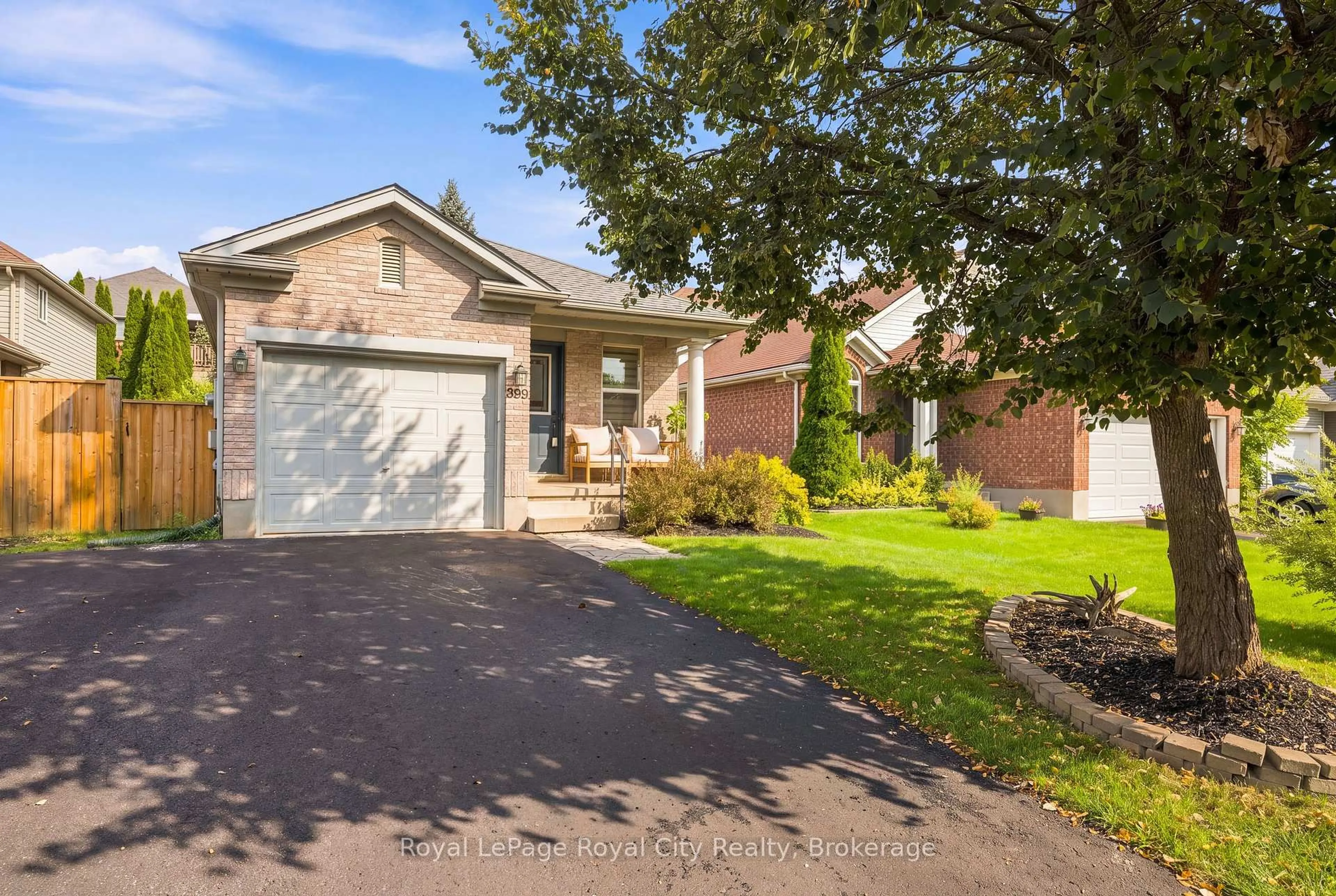 Home with brick exterior material, street for 399 STARWOOD Dr, Guelph Ontario N1E 7A3