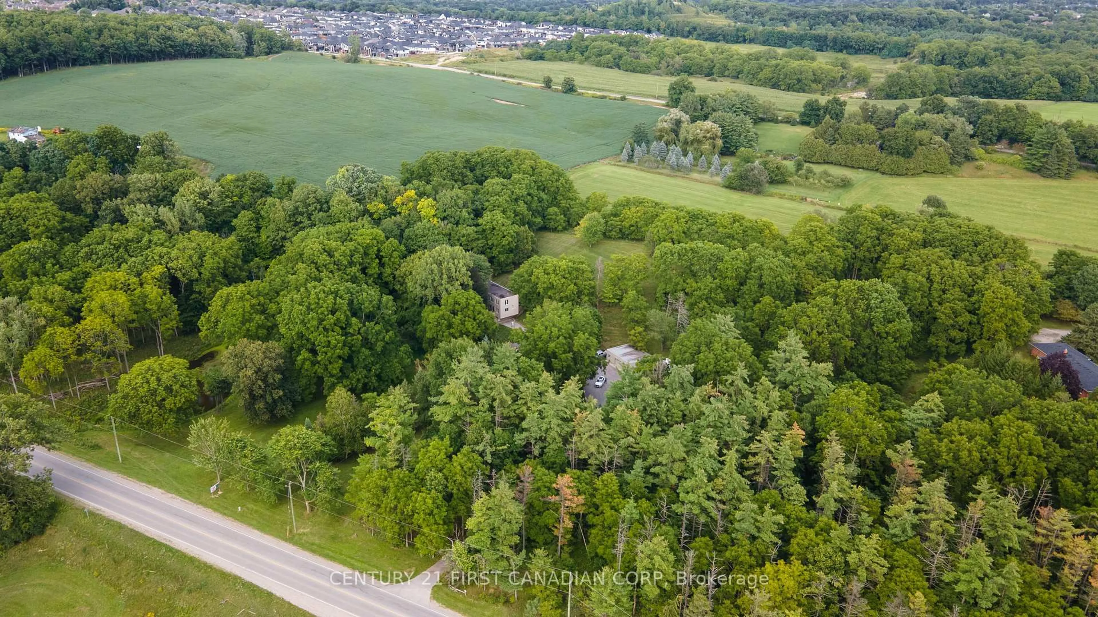 A pic from outside/outdoor area/front of a property/back of a property/a pic from drone, forest/trees view for 2546 Westdel Bourne, London South Ontario N6K 4R3