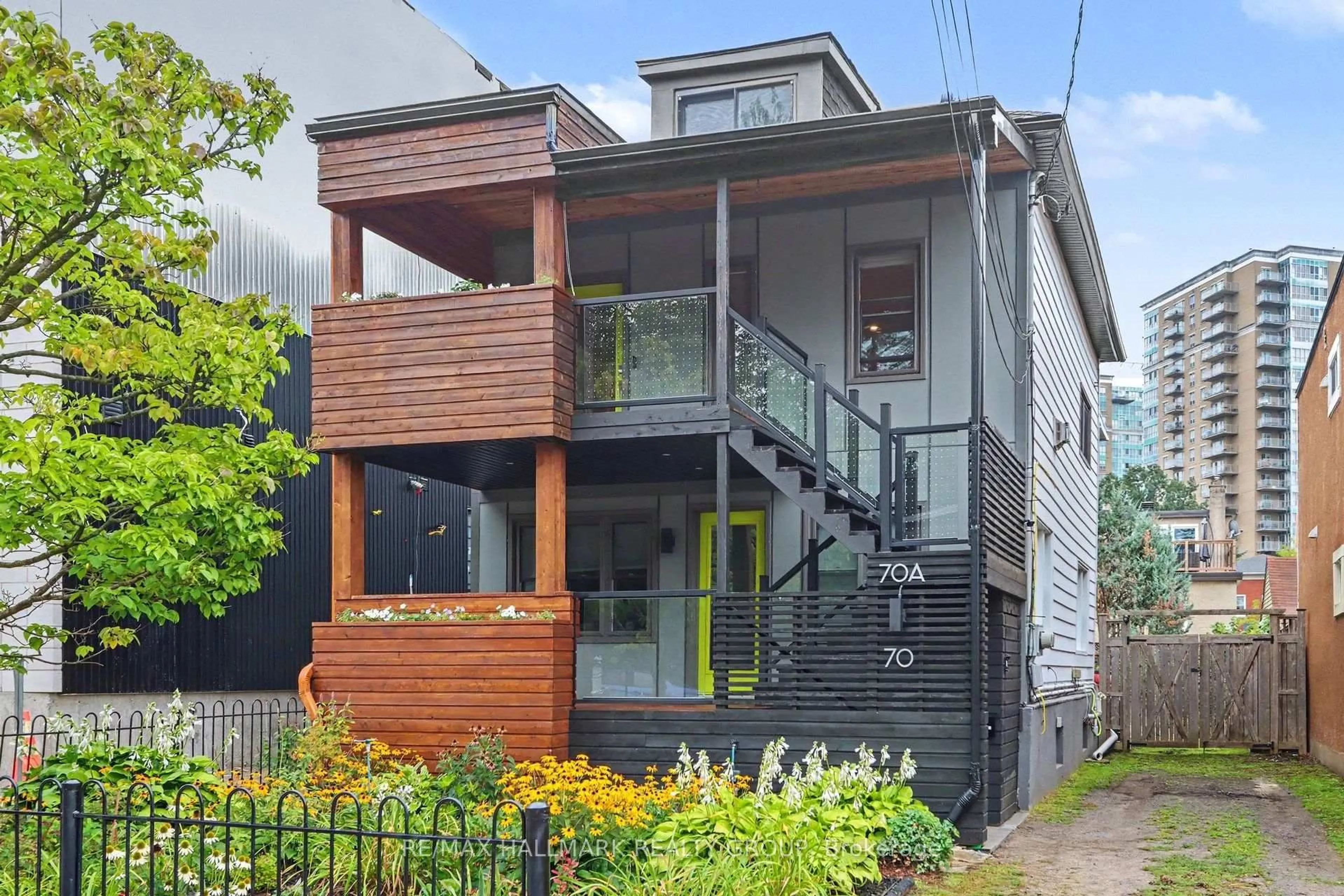 Home with vinyl exterior material, street for 70 Laval St, Ottawa Ontario K1L 7Z6