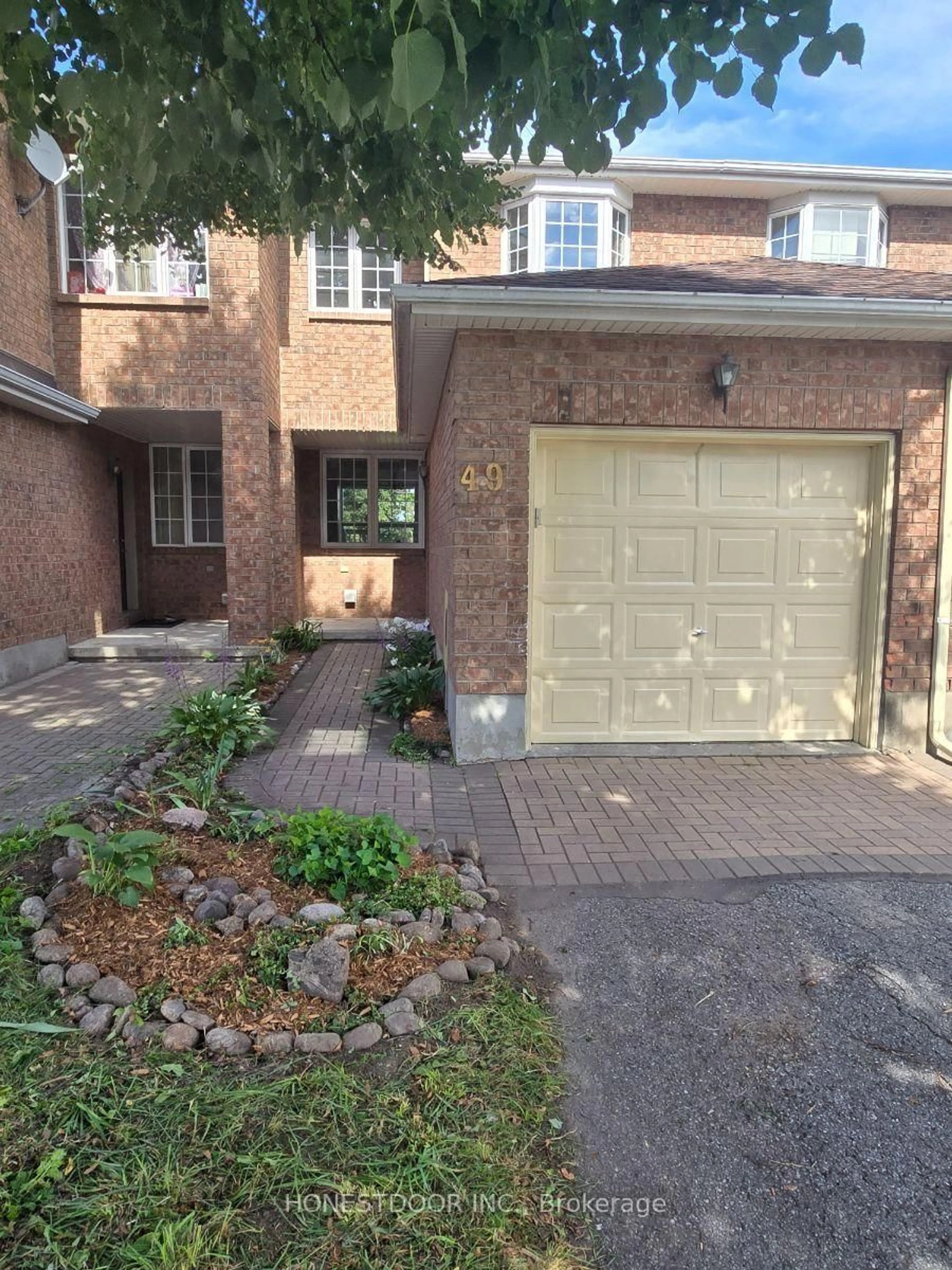 Home with brick exterior material, street for 49 Mullcraft Cres, Ottawa Ontario K2J 4P7